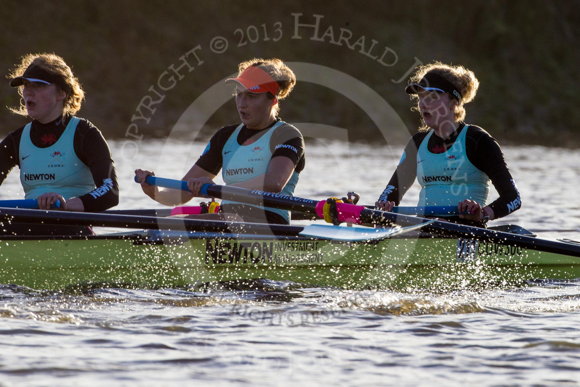 The Boat Race season 2014 - Women's Trial VIIIs(CUWBC, Cambridge): Nudge Nudge: 3 Hannah Evans, 2 Anouska Bartlett, Bow Lottie Meggitt..
River Thames between Putney Bridge and Mortlake,
London SW15,

United Kingdom,
on 19 December 2013 at 14:13, image #431