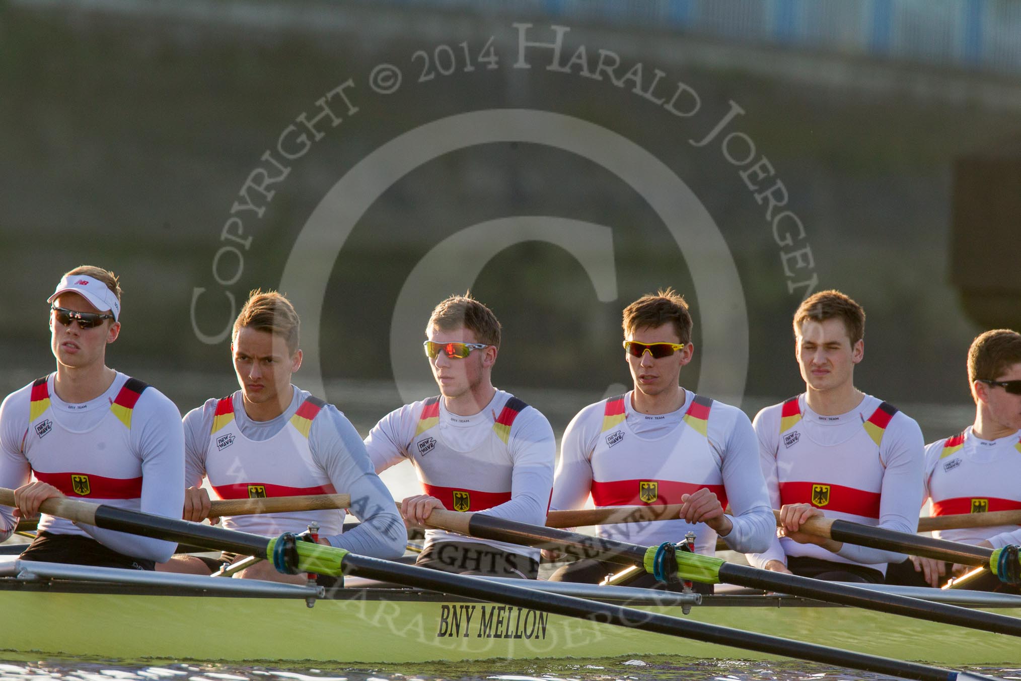 The Boat Race season 2014 - fixture OUBC vs German U23: The German U23 boat waiting under Putney Bridge:  7 Ole Schwiethal, 6 Arne Schwiethal, 5 Johannes Weissenfeld, 4 Maximilian Korge, 3 Malte Daberkow, 2 Finn Knuppel..
River Thames between Putney Bridge and Chiswick Bridge,



on 08 March 2014 at 16:43, image #24