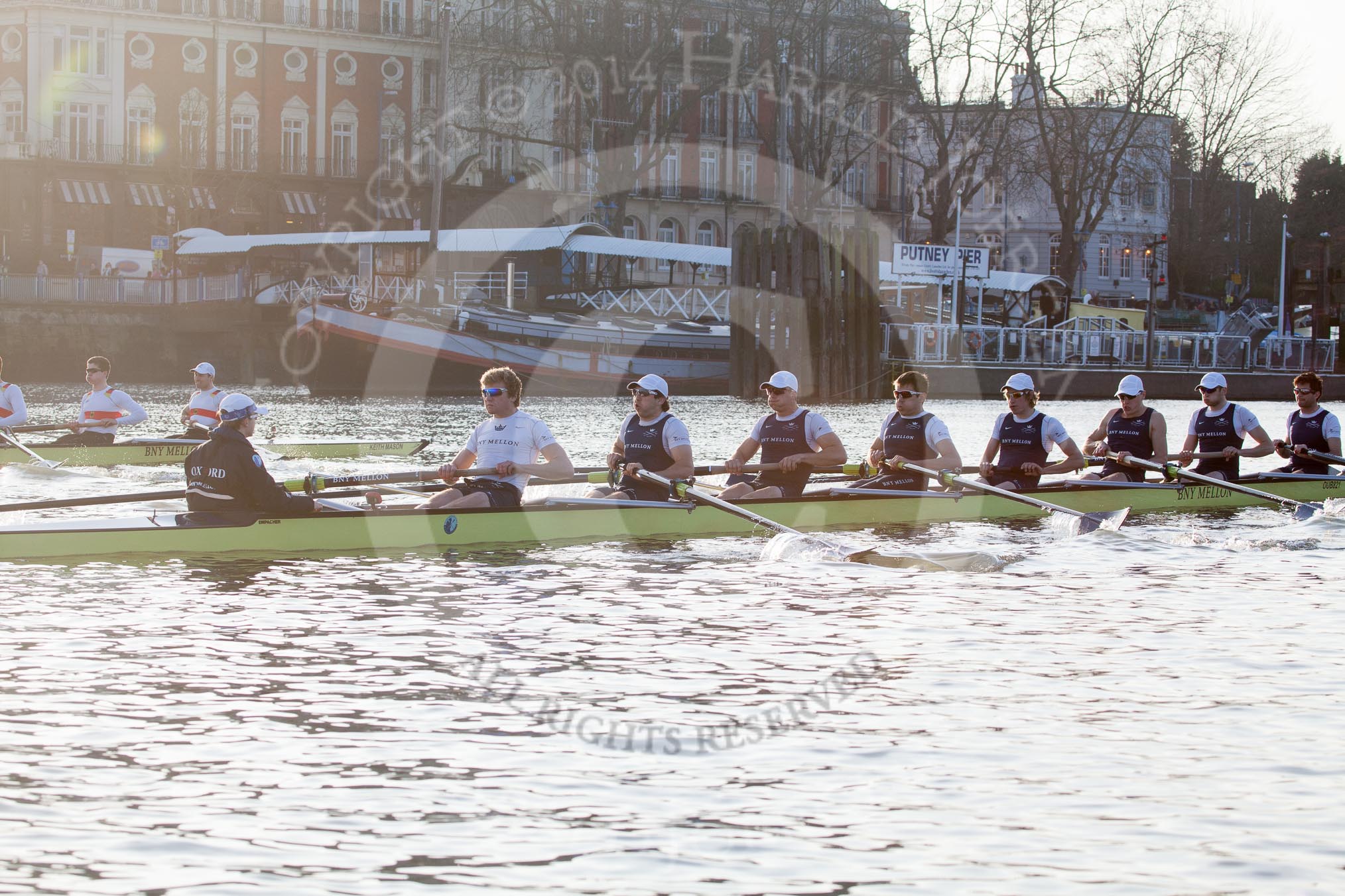 Photo 1403081646015D26724HaraldJoergens The Boat Race season 2014 - fixture OUBC vs German U23: The race is on - the German U23-boat, on the left, and the OUBC boat approaching Putney Pier..
River Thames between Putney Bridge and Chiswick Bridge,
on 08 March 2014 at 16:45, image #32
