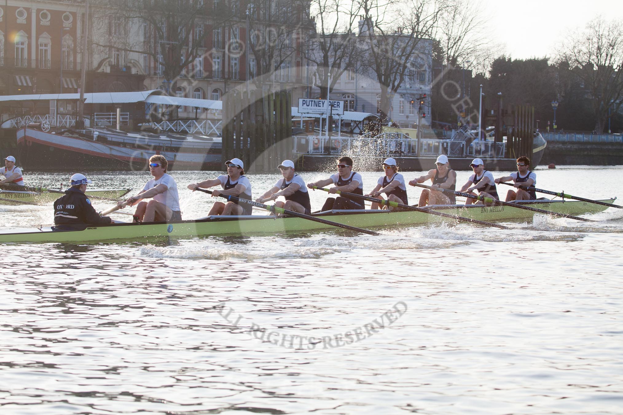 The Boat Race season 2014 - fixture OUBC vs German U23: The race is on - the German U23-boat, on the left, and the OUBC boat approaching Putney Pier..
River Thames between Putney Bridge and Chiswick Bridge,



on 08 March 2014 at 16:45, image #33