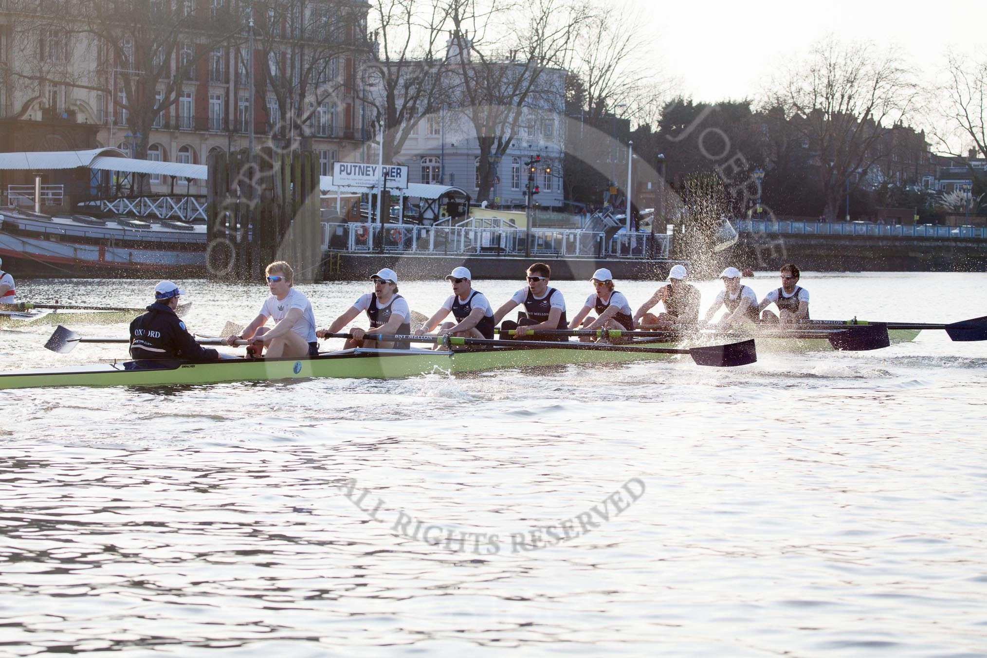 The Boat Race season 2014 - fixture OUBC vs German U23: The race is on - the German U23-boat, on the left, and the OUBC boat approaching Putney Pier..
River Thames between Putney Bridge and Chiswick Bridge,



on 08 March 2014 at 16:45, image #34