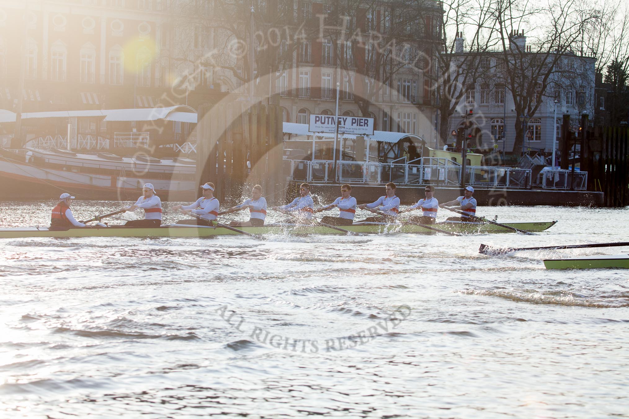 The Boat Race season 2014 - fixture OUBC vs German U23: The race is on - the German U23-boat, on the left, and the OUBC boat approaching Putney Pier..
River Thames between Putney Bridge and Chiswick Bridge,



on 08 March 2014 at 16:46, image #35