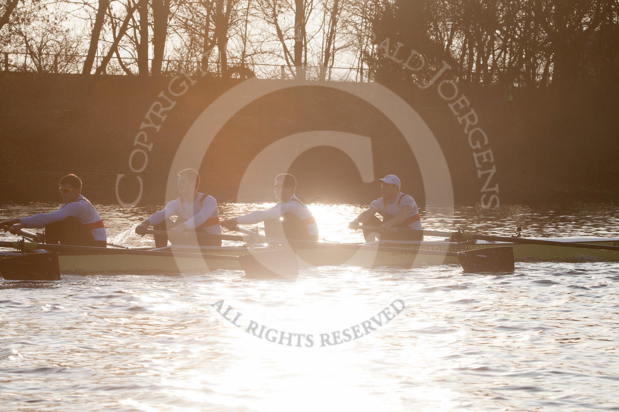 The Boat Race season 2014 - fixture OUBC vs German U23: The German U23-boat near St Paul's School, shot against the low evening sun..
River Thames between Putney Bridge and Chiswick Bridge,



on 08 March 2014 at 16:53, image #119