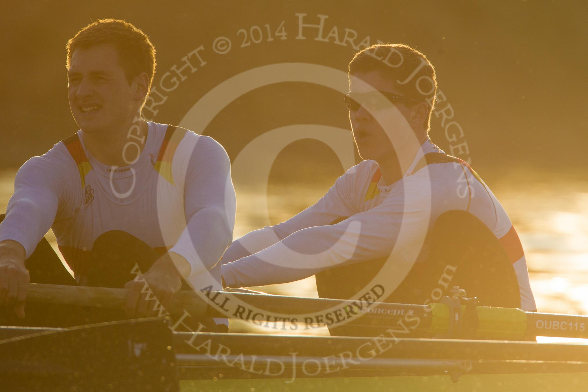 The Boat Race season 2014 - fixture OUBC vs German U23: The German U23 during the first race, shot against the low evening sun: 3 Malte Daberkow, 2 Finn Knuppel..
River Thames between Putney Bridge and Chiswick Bridge,



on 08 March 2014 at 16:54, image #127