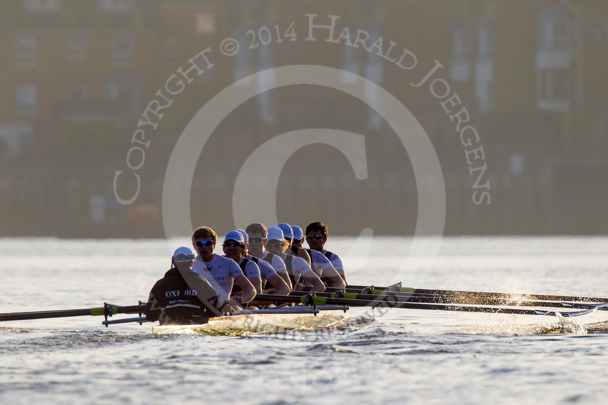 The Boat Race season 2014 - fixture OUBC vs German U23: The OUBC boat in the low evening sun..
River Thames between Putney Bridge and Chiswick Bridge,



on 08 March 2014 at 16:56, image #150
