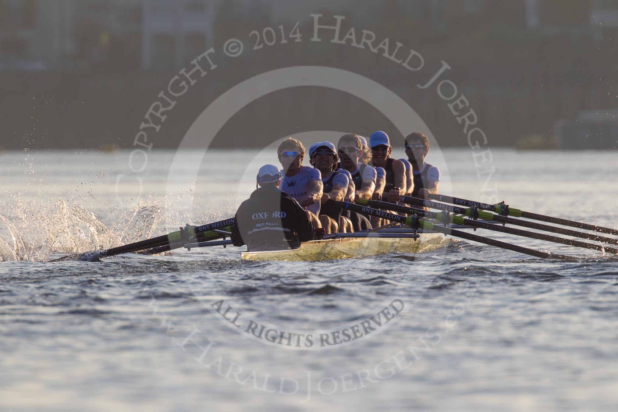 The Boat Race season 2014 - fixture OUBC vs German U23: The OUBC boat in the low evening sun..
River Thames between Putney Bridge and Chiswick Bridge,



on 08 March 2014 at 16:56, image #152