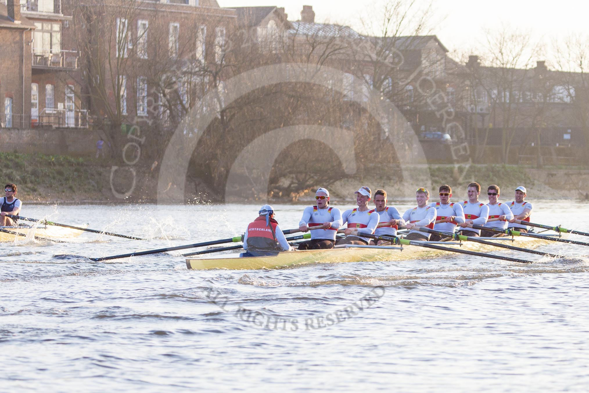 The Boat Race season 2014 - fixture OUBC vs German U23: The German U23 boat during the second race between Barnes Railway Bridge and the finish line at Chiswick Bridge, with the OUBC boat on the left..
River Thames between Putney Bridge and Chiswick Bridge,



on 08 March 2014 at 17:08, image #242