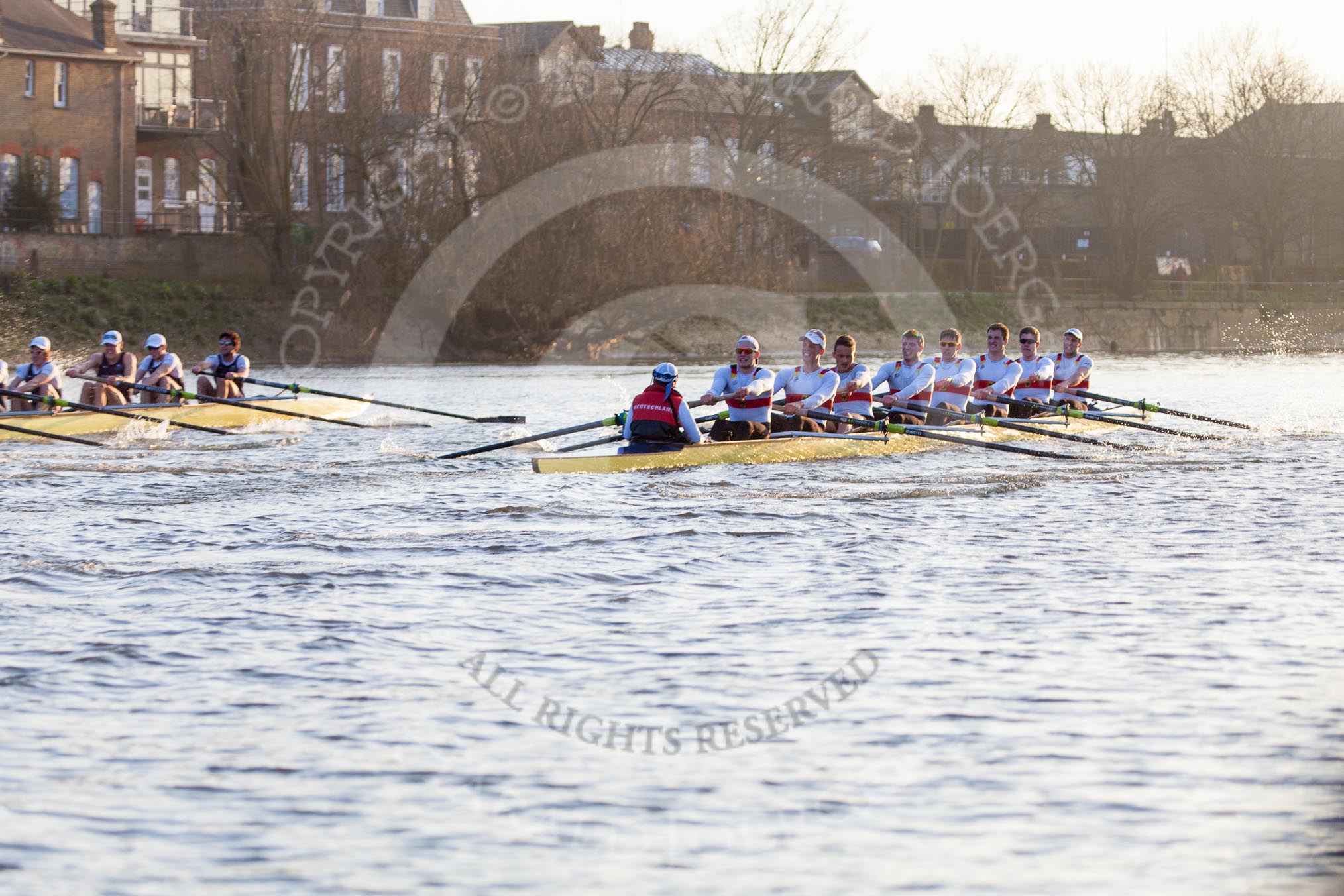 The Boat Race season 2014 - fixture OUBC vs German U23: The German U23 boat during the second race between Barnes Railway Bridge and the finish line at Chiswick Bridge, with the OUBC boat on the left..
River Thames between Putney Bridge and Chiswick Bridge,



on 08 March 2014 at 17:08, image #243