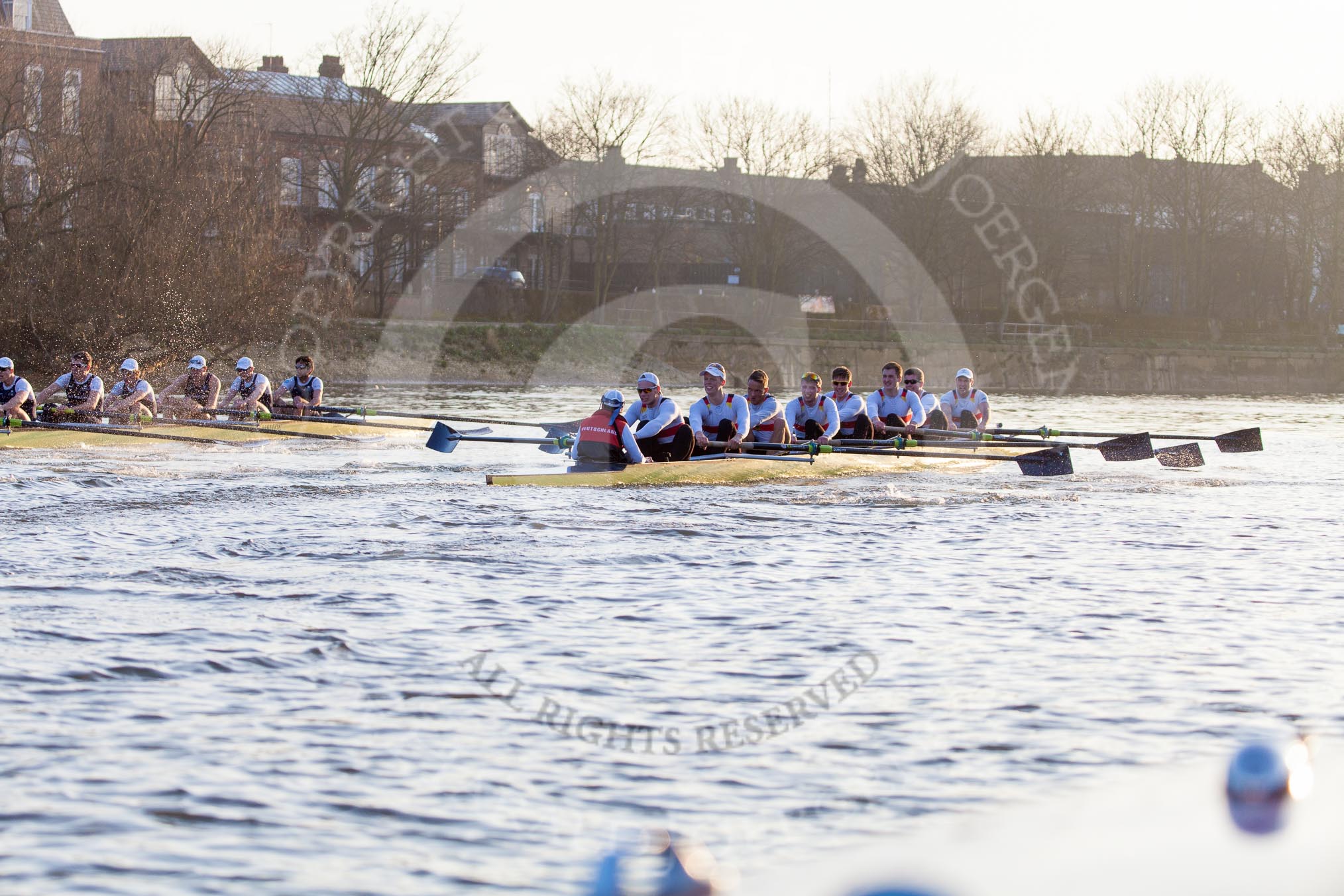 The Boat Race season 2014 - fixture OUBC vs German U23: The OUBC boat, on the left, and the German U23 boat during the second race between Barnes Railway Bridge and the finish line at Chiswick Bridge..
River Thames between Putney Bridge and Chiswick Bridge,



on 08 March 2014 at 17:08, image #244