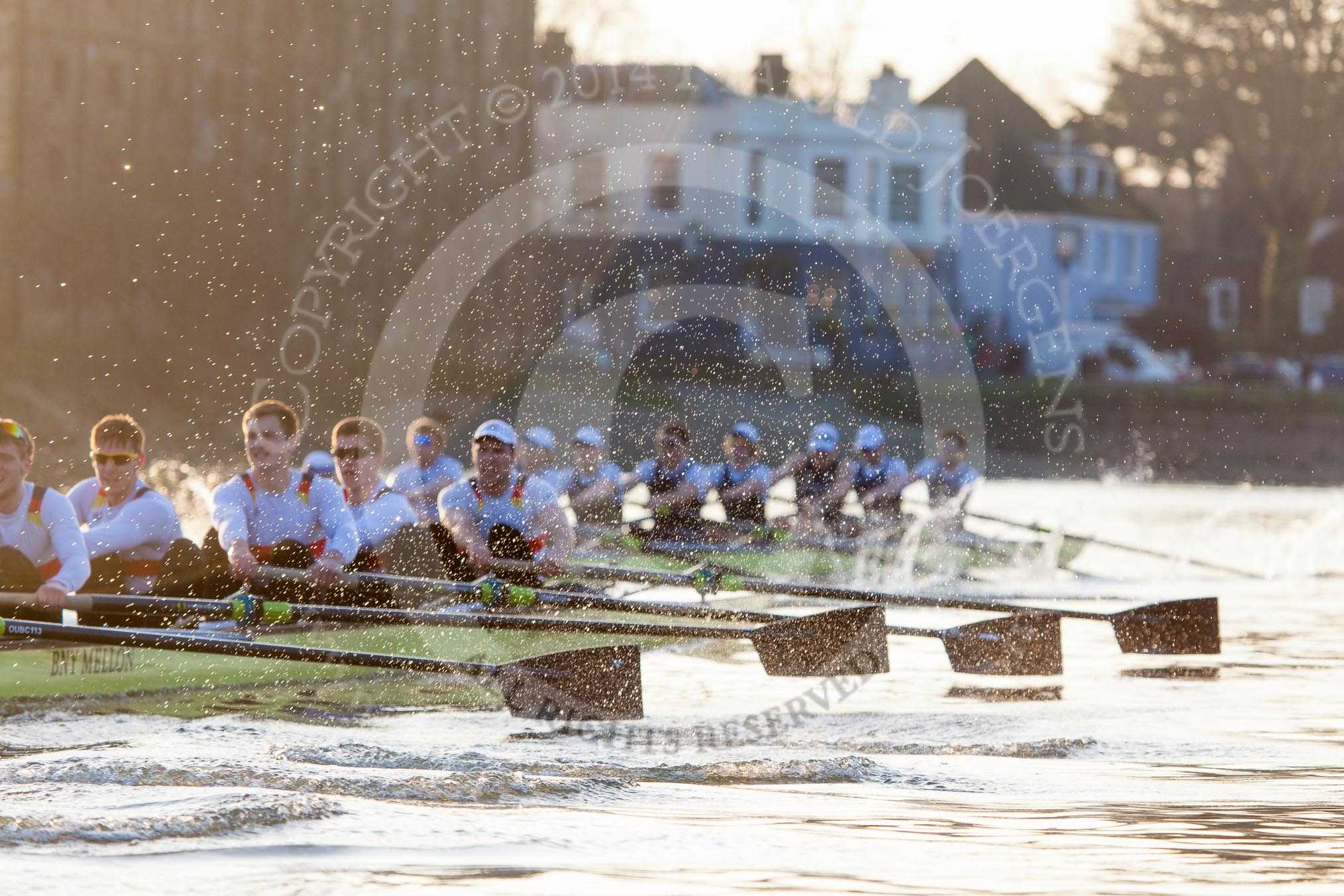 The Boat Race season 2014 - fixture OUBC vs German U23: The OUBC boat, on the left, taking the laed over the German U23 boat during the second race between Barnes Railway Bridge and the finish line at Chiswick Bridge..
River Thames between Putney Bridge and Chiswick Bridge,



on 08 March 2014 at 17:10, image #256