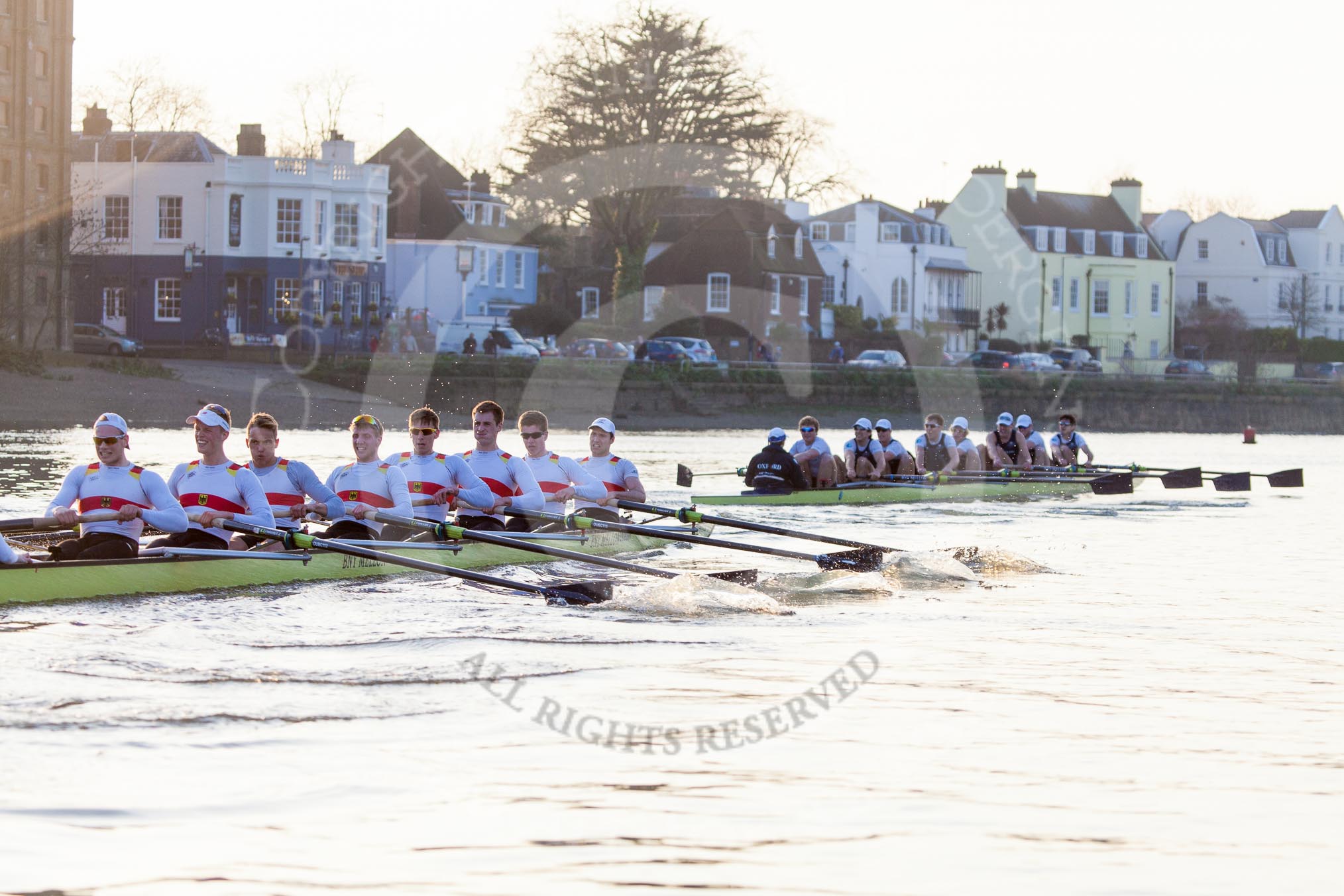 The Boat Race season 2014 - fixture OUBC vs German U23: The OUBC boat, on the left, taking the laed over the German U23 boat during the second race between Barnes Railway Bridge and the finish line at Chiswick Bridge..
River Thames between Putney Bridge and Chiswick Bridge,



on 08 March 2014 at 17:10, image #257