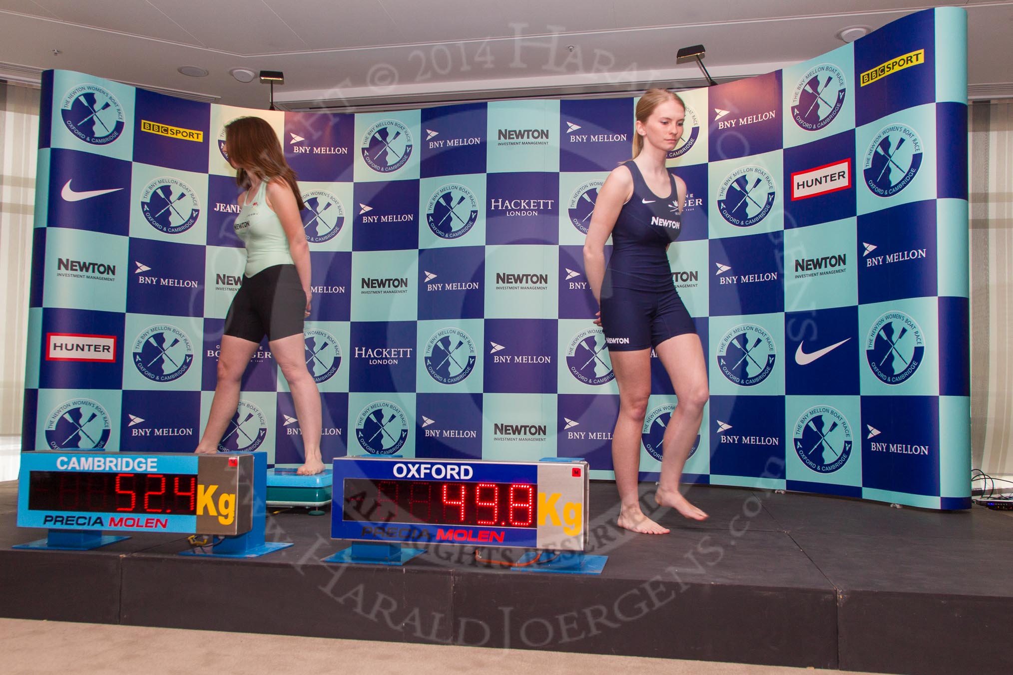 The Boat Race season 2014 - Crew Announcement and Weigh In: The 2014 Women's Boat Race crews, Cambridge cox Esther Momcilovic   and Oxford cox Erin Wysocki-Jones leaving the stage before the inerviews with the coaches..
BNY Mellon Centre,
London EC4V 4LA,
London,
United Kingdom,
on 10 March 2014 at 11:51, image #59