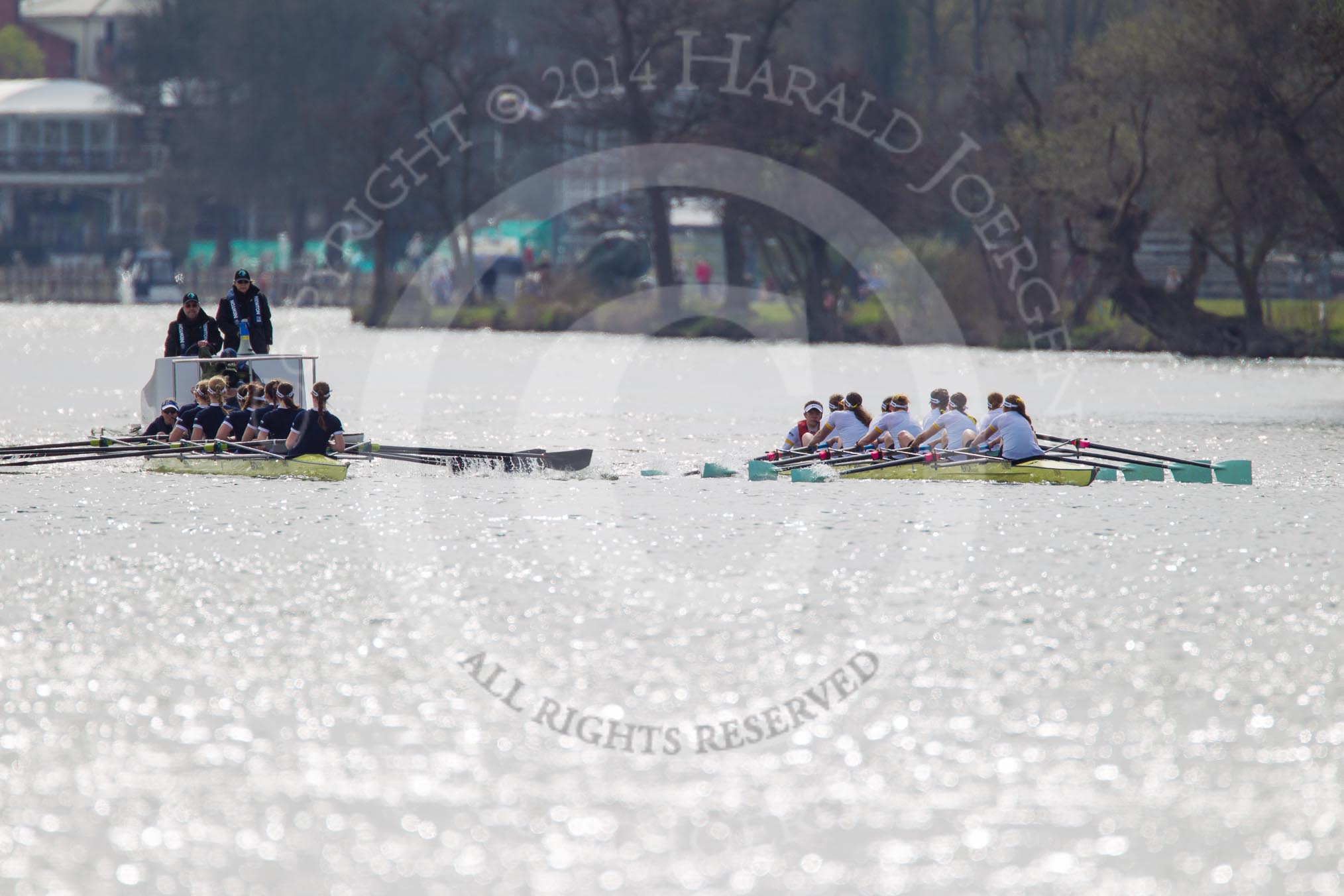 The Women's Boat Race and Henley Boat Races 2014: The Women's Reserves - Osiris v. Blondie race. Osiris (Oxford) on the left,  and Blondie (Cambridge) are still quite close together..
River Thames,
Henley-on-Thames,
Buckinghamshire,
United Kingdom,
on 30 March 2014 at 14:16, image #142