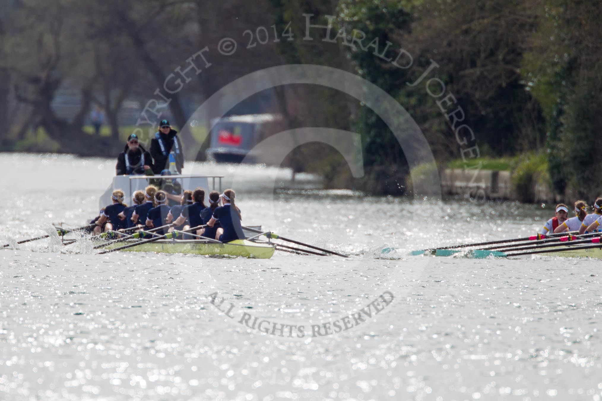 The Women's Boat Race and Henley Boat Races 2014: The Women's Reserves - Osiris v. Blondie race. Osiris (Oxford) on the left,  and Blondie (Cambridge) are still quite close together..
River Thames,
Henley-on-Thames,
Buckinghamshire,
United Kingdom,
on 30 March 2014 at 14:16, image #145