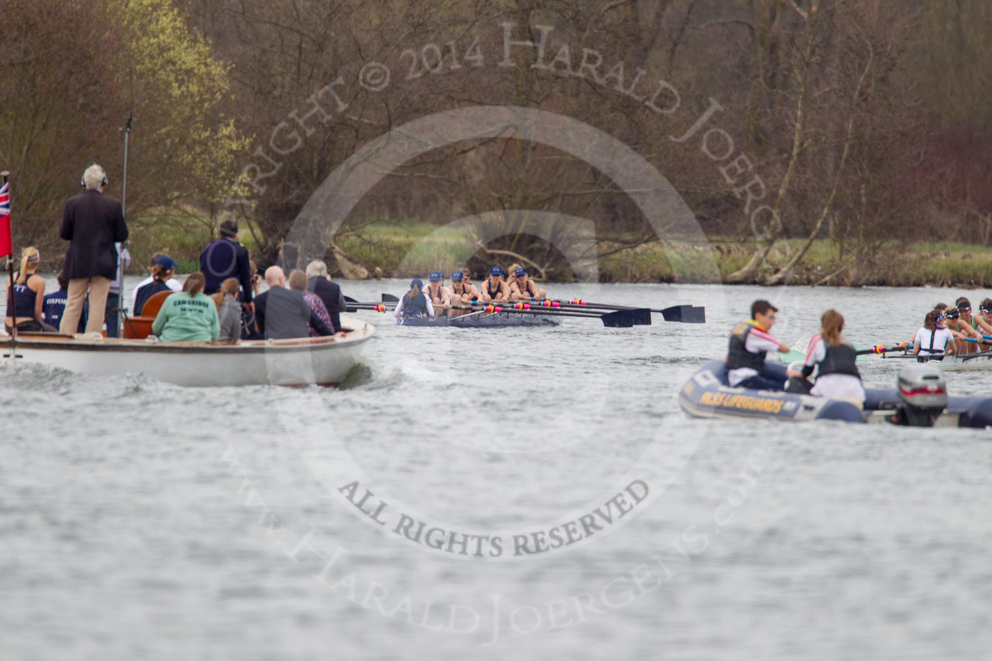 The Women's Boat Race and Henley Boat Races 2014: The Lightweight Women's Boat Race - OUWLRC and CUWBC Lightweights are approaching the finish line, followed by the press launch..
River Thames,
Henley-on-Thames,
Buckinghamshire,
United Kingdom,
on 30 March 2014 at 14:50, image #247