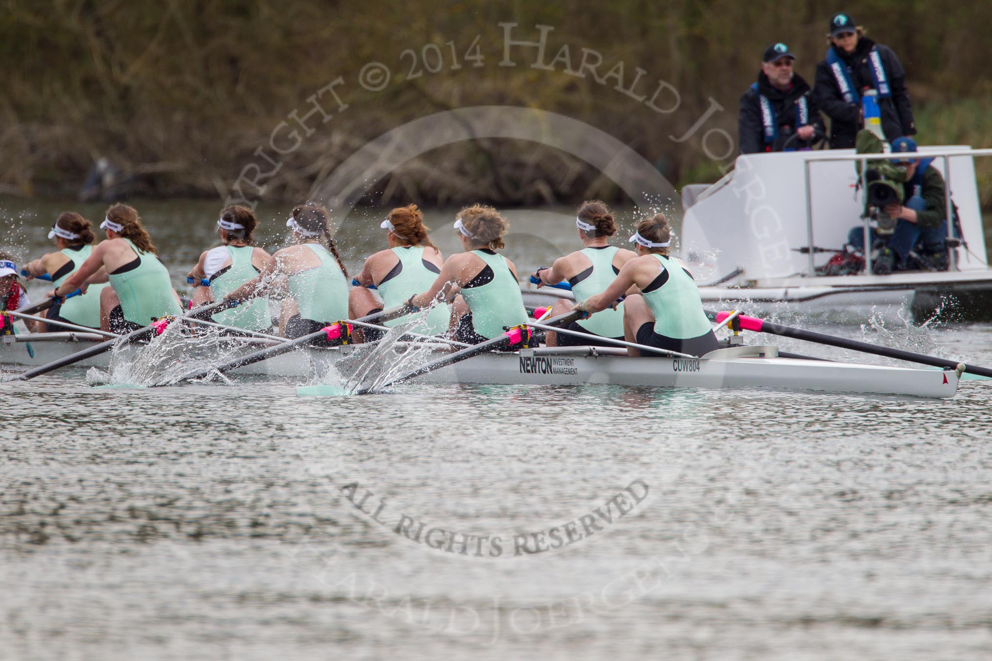 The Women's Boat Race and Henley Boat Races 2014: The Women's Boat Race: Next to the Cambridge Eight is the umpire's launch, with a TV cameraman in front..
River Thames,
Henley-on-Thames,
Buckinghamshire,
United Kingdom,
on 30 March 2014 at 15:14, image #293