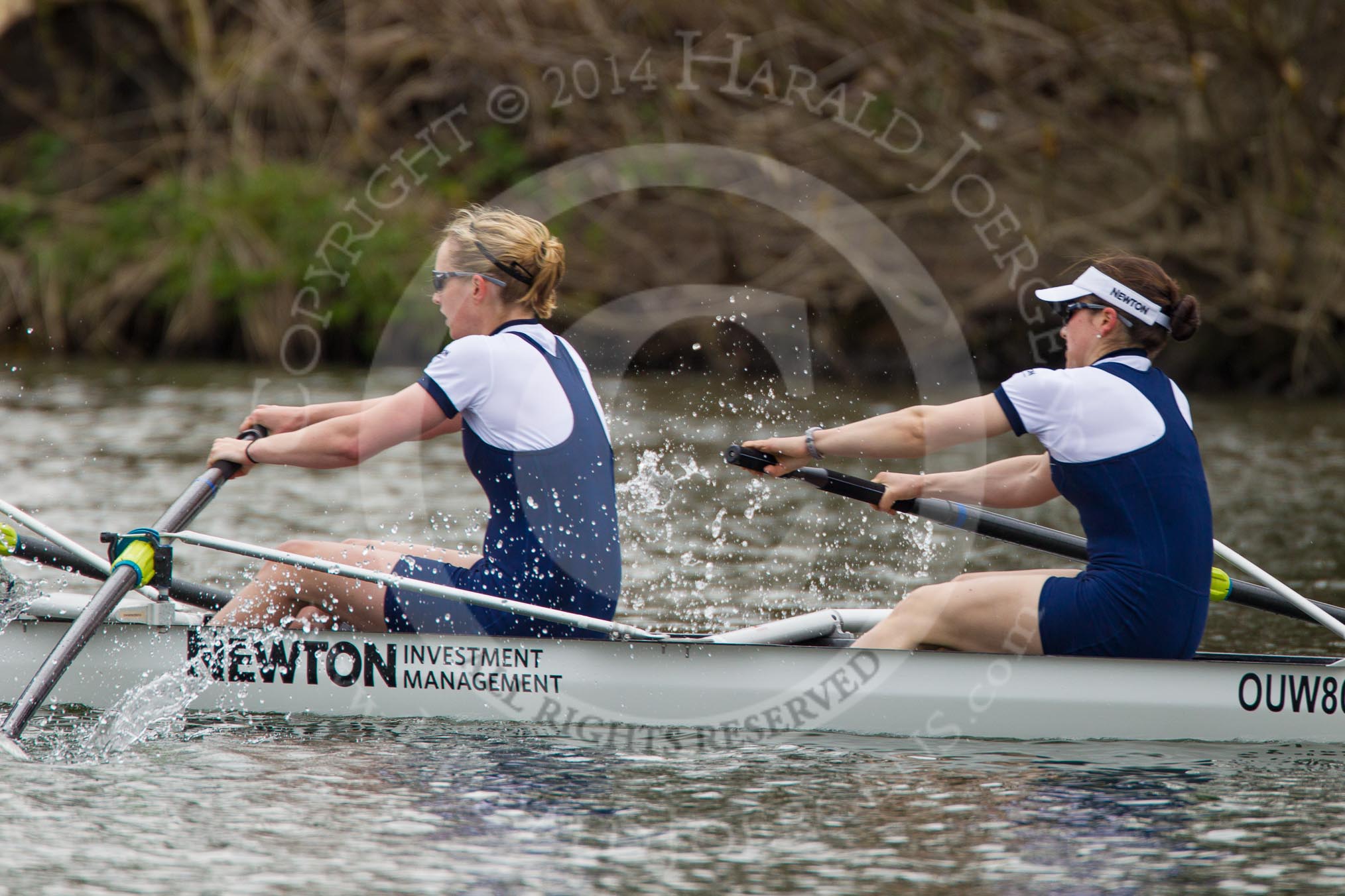 The Women's Boat Race and Henley Boat Races 2014: The Women's Boat Race: Oxford is leading, here the Oxford boat with 2 seat Alice Carrington-Windo and bow Elizabeth Fenje at bow..
River Thames,
Henley-on-Thames,
Buckinghamshire,
United Kingdom,
on 30 March 2014 at 15:14, image #295