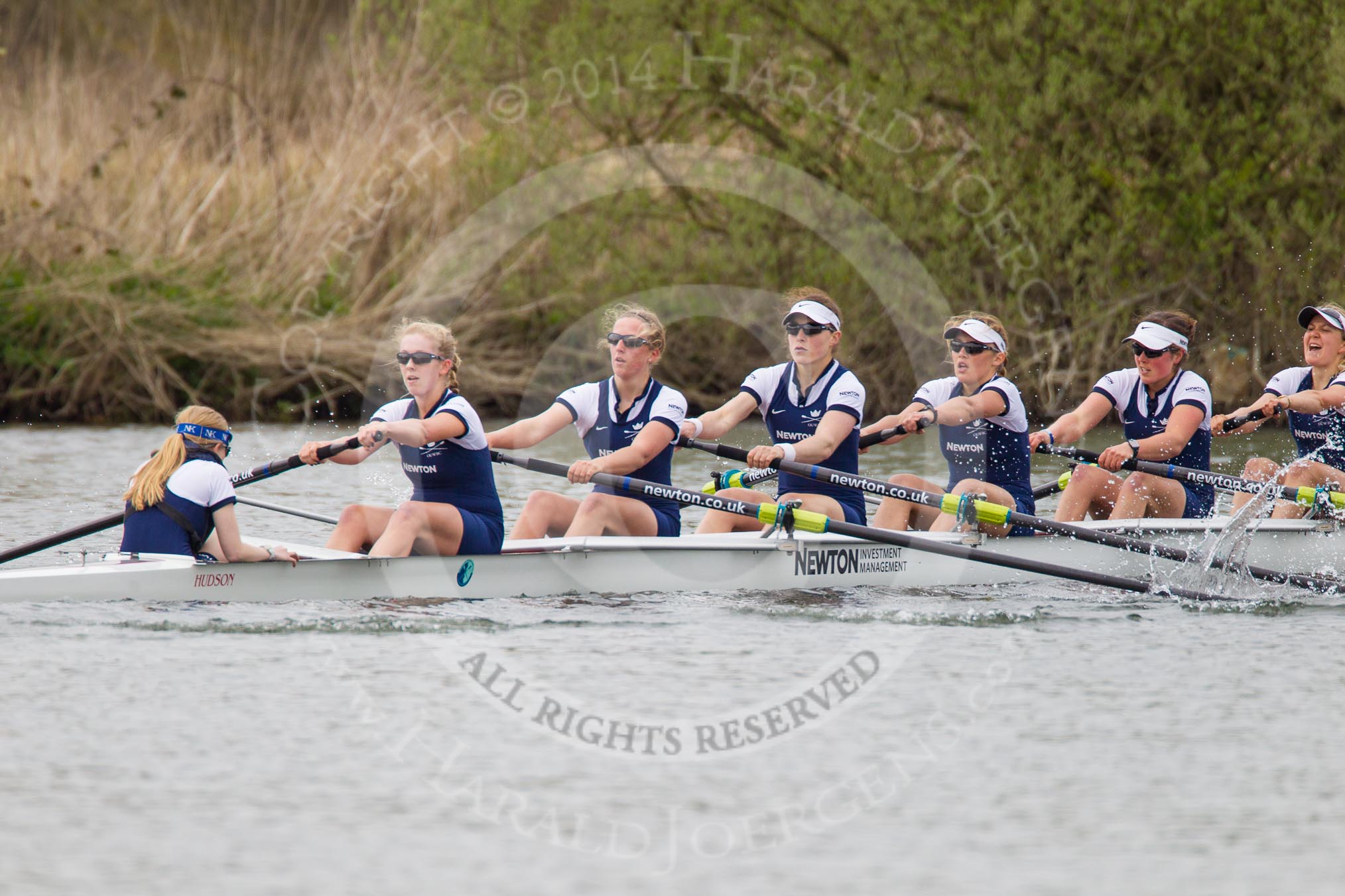 The Women's Boat Race and Henley Boat Races 2014: The Newton Women's Boat Race - Oxford in the lead, here cox Erin Wysocki-Jones, stroke Amber de Vere, 7 Anastasia Chitty, 6 Laura Savarese, 5 Nadine Graedel Iberg, 4 Lauren Kedar, 3 Maxie Scheske..
River Thames,
Henley-on-Thames,
Buckinghamshire,
United Kingdom,
on 30 March 2014 at 15:15, image #302
