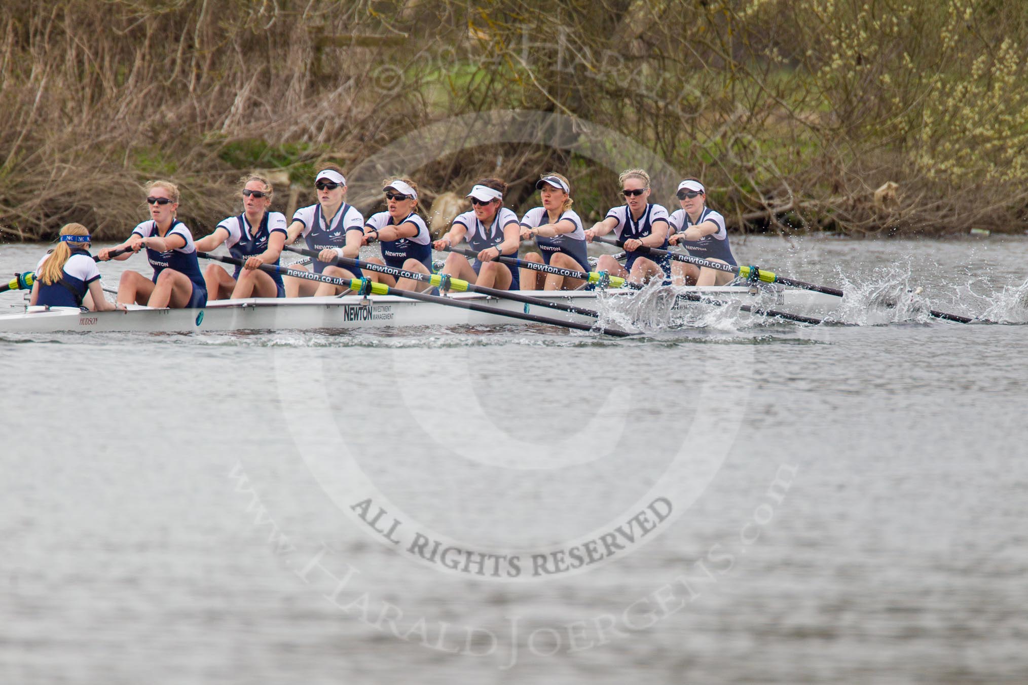 The Women's Boat Race and Henley Boat Races 2014: The Newton Women's Boat Race - Oxford in the lead: Cox Erin Wysocki-Jones, stroke Amber de Vere, 7 Anastasia Chitty, 6 Laura Savarese, 5 Nadine Graedel Iberg, 4 Lauren Kedar, 3 Maxie Scheske, 2 Alice Carrington-Windo, bow Elizabeth Fenje..
River Thames,
Henley-on-Thames,
Buckinghamshire,
United Kingdom,
on 30 March 2014 at 15:15, image #306