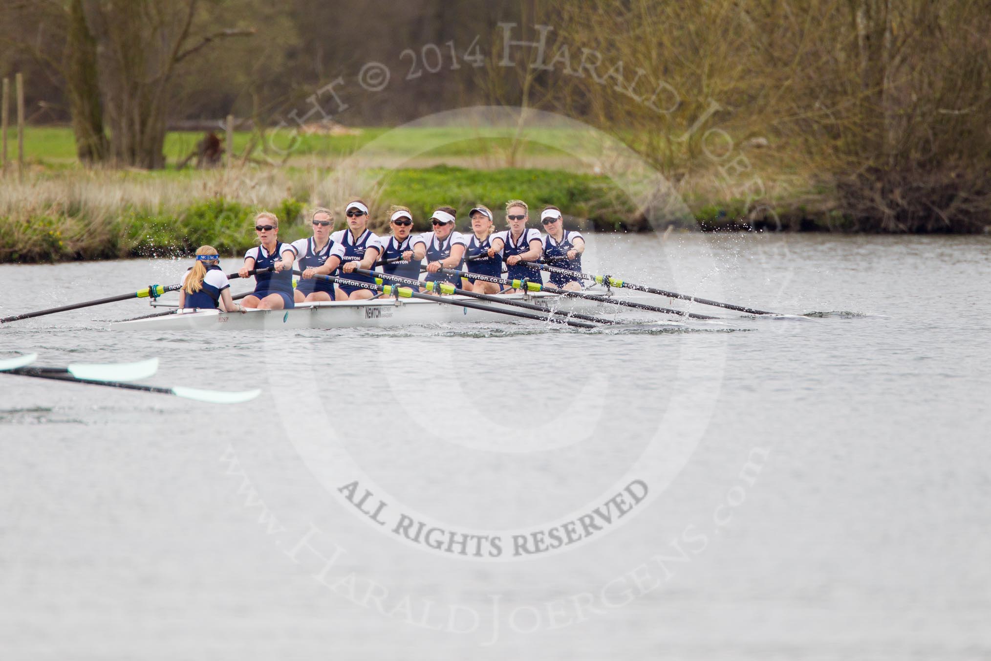 The Women's Boat Race and Henley Boat Races 2014: The Newton Women's Boat Race - Oxford in the lead, approaching the finish line, Cambridge behind and just visible on the left..
River Thames,
Henley-on-Thames,
Buckinghamshire,
United Kingdom,
on 30 March 2014 at 15:15, image #310