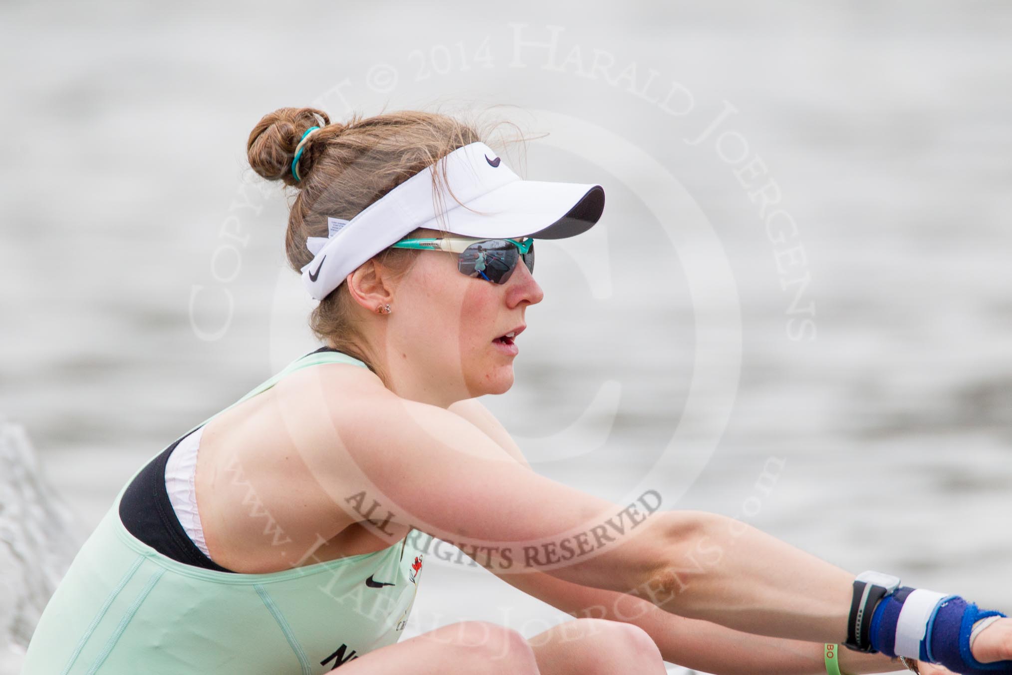 The Women's Boat Race and Henley Boat Races 2014: After  the Newton Women's Boat Race, the Cambridge crew is rowing back to Henley. Here, in the bow seat, Caroline Reid..
River Thames,
Henley-on-Thames,
Buckinghamshire,
United Kingdom,
on 30 March 2014 at 15:23, image #342
