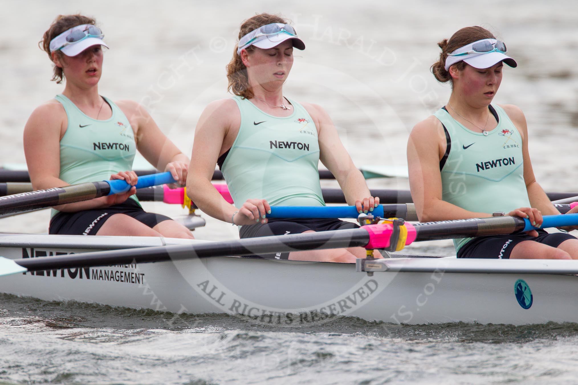 The Women's Boat Race and Henley Boat Races 2014: After  the Newton Women's Boat Race, the Cambridge crew is rowing back to Henley. Here, in the 6 seat, Melissa Wilson, 7 Claire Watkins, stroke Emily Day..
River Thames,
Henley-on-Thames,
Buckinghamshire,
United Kingdom,
on 30 March 2014 at 15:23, image #351