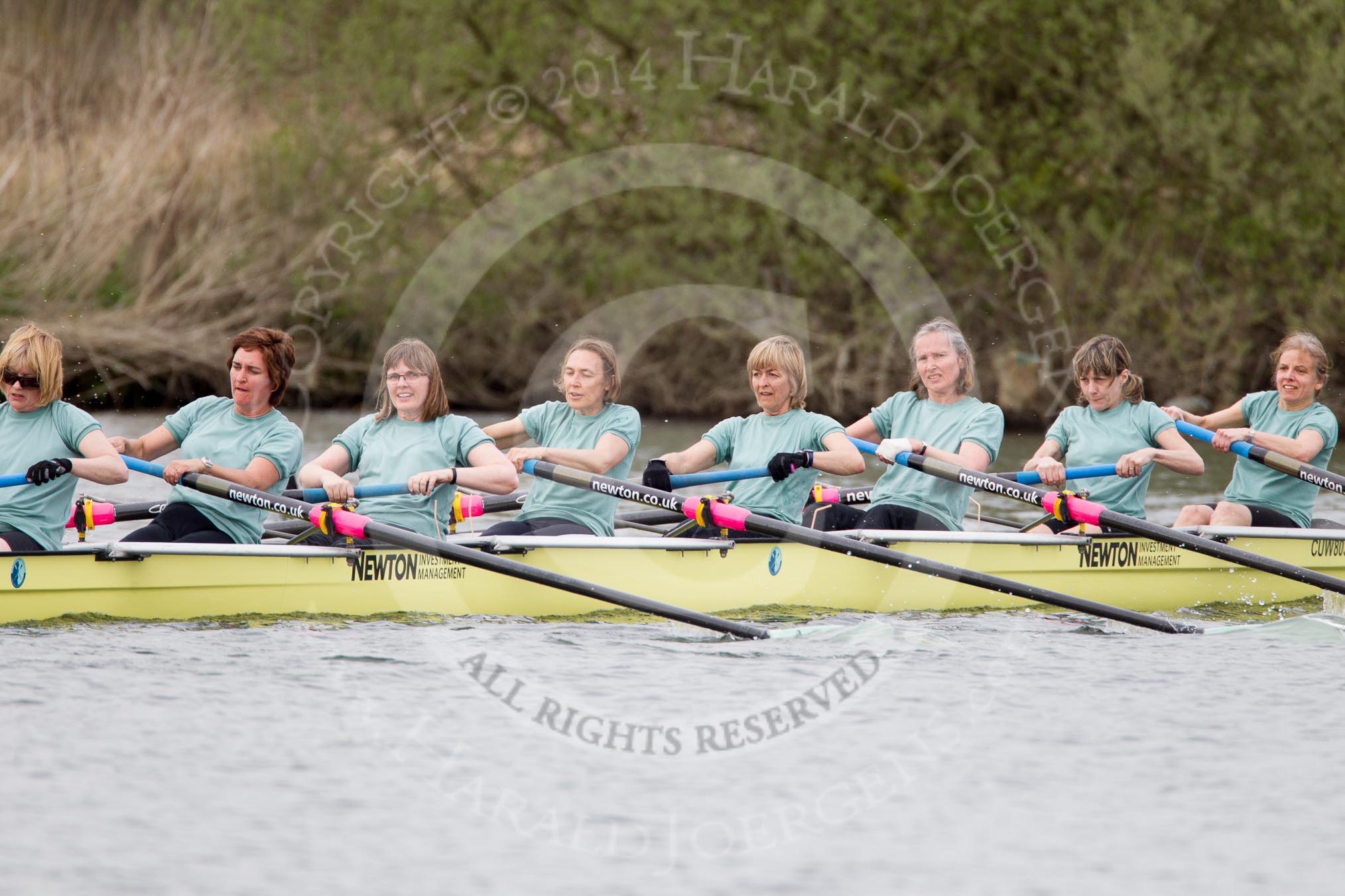 The Women's Boat Race and Henley Boat Races 2014: The Commemorative Row Past of the 1984 inaugural crews of the Oxford and Cambridge Women’s Lightweight races, to celebrate 30 years at Henley: In the CUWBC boat Stroke Louise Makin, 7 Sarah Wilshaw-Sparkes (Wilshaw), 6 Kathryn Pocock (Langsford), 5 Stephanie Bew, 4 Jane Maher (Fullam), 3 Lynelle Bishop (Walker-Smith), 2 Mary Harrison (Phillips), bow Deanna Fernie (Turner).
River Thames,
Henley-on-Thames,
Buckinghamshire,
United Kingdom,
on 30 March 2014 at 15:54, image #440