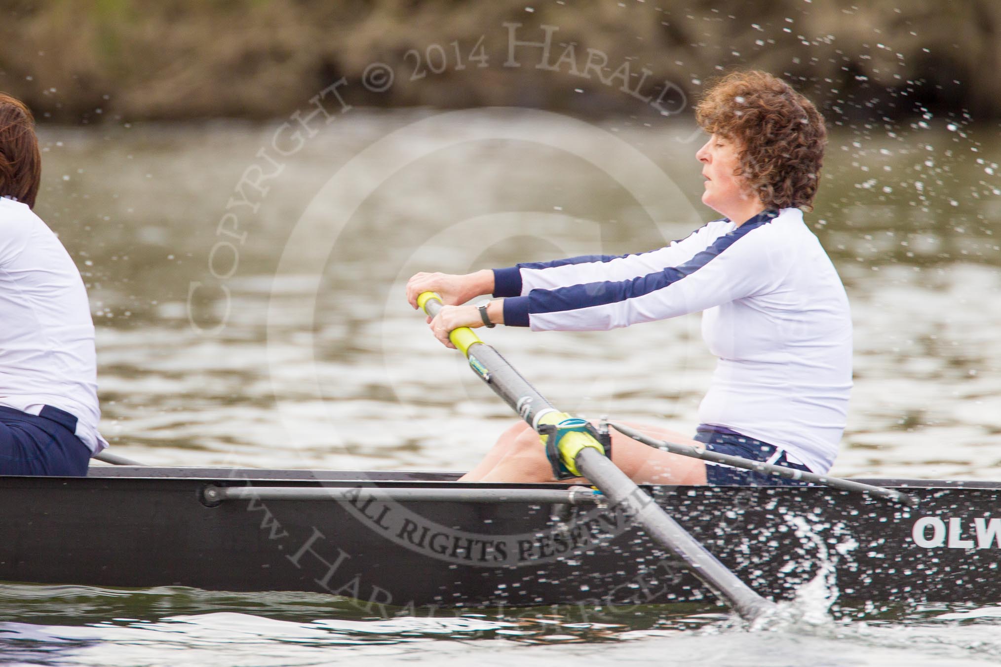 The Women's Boat Race and Henley Boat Races 2014: The Commemorative Row Past of the 1984 inaugural crews of the Oxford and Cambridge Women’s Lightweight races, to celebrate 30 years at Henley: In the OUWBC boat at bow Rozi Bartlett..
River Thames,
Henley-on-Thames,
Buckinghamshire,
United Kingdom,
on 30 March 2014 at 15:55, image #445