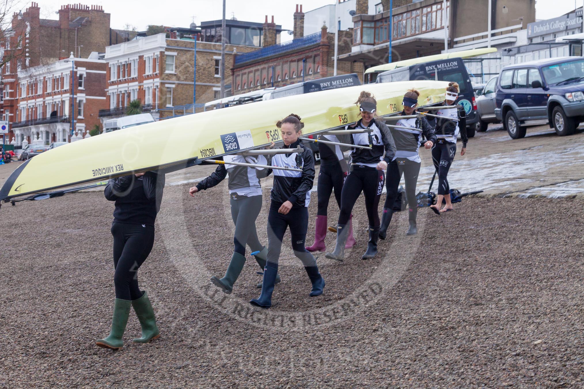 Molesey BC carrying their boat from Putney Embankmen down to the river