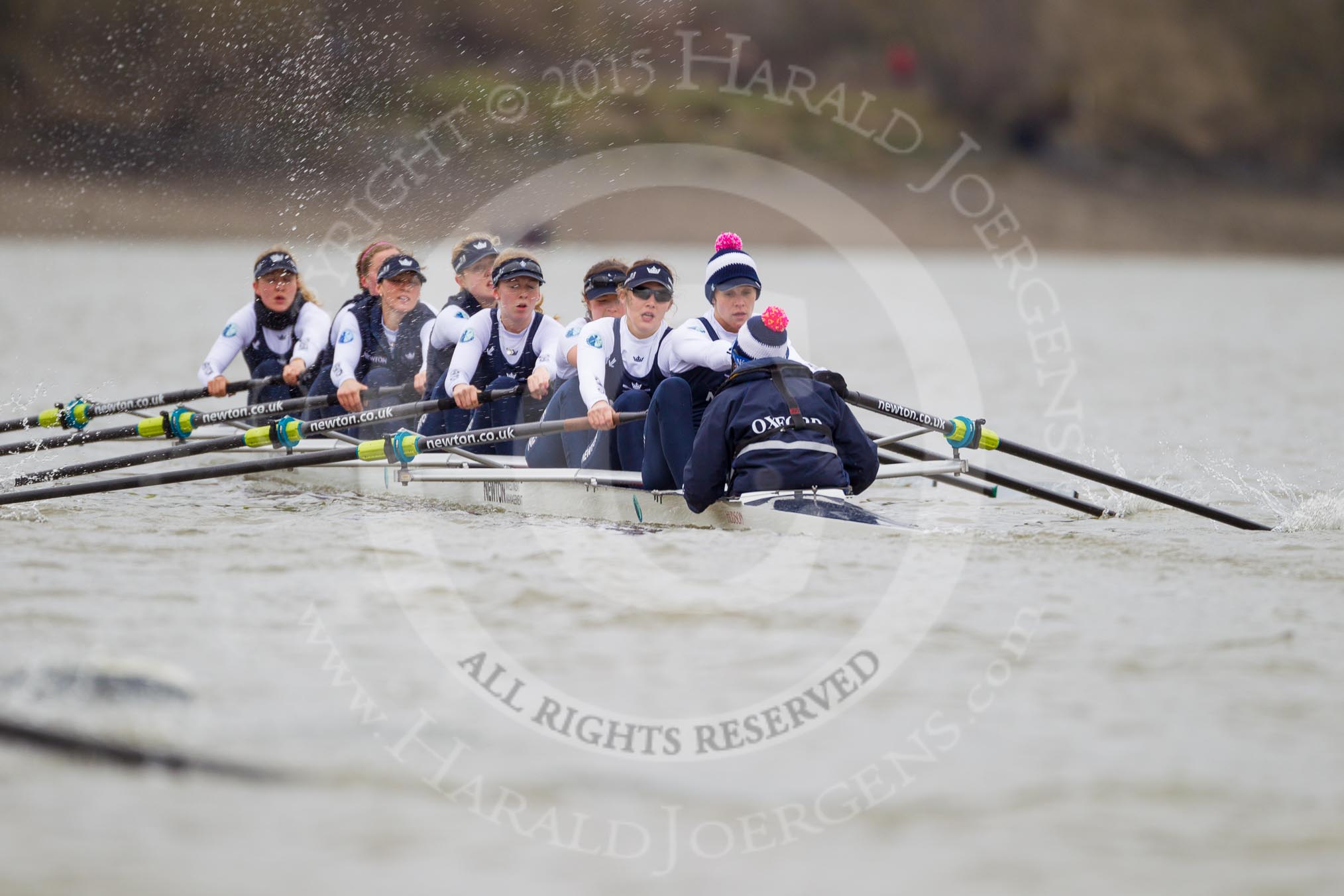 The OUWBC boat near the milepost - Maxie Scheske, Anastasia Chitty, Shelley Pearson, Emily Reynolds, Amber De Vere, Lauren Kedar, Nadine Gradel Iberg, Caryn Davies, and cox Jennifer Ehr