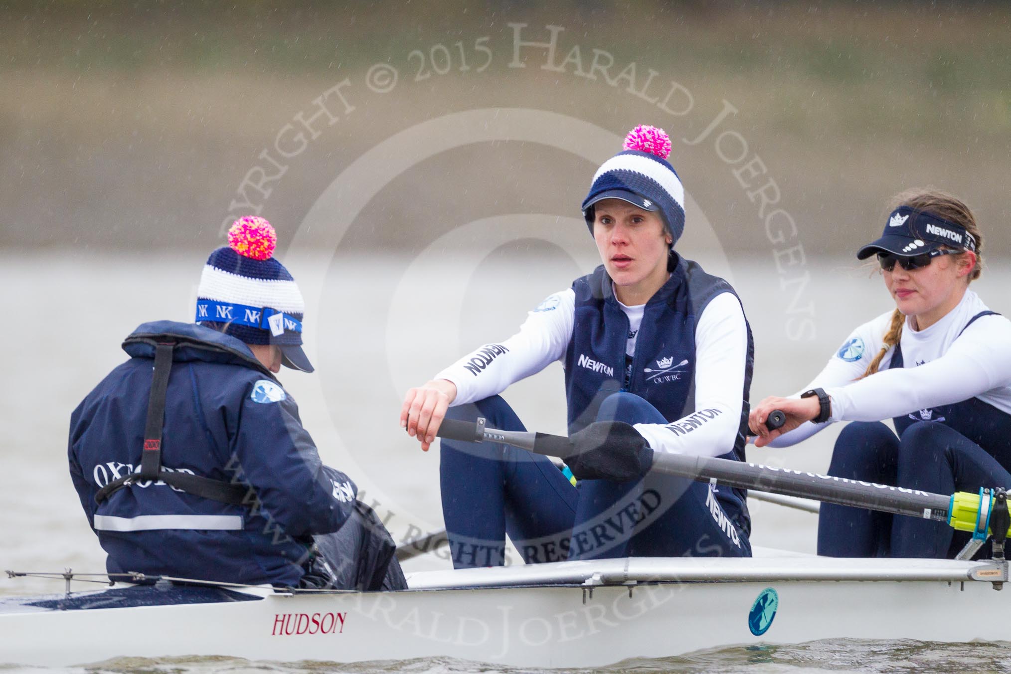 OUWBC cox Jennifer Ehr, stroke Caryn Davies, and 7 seat Nadine Gradel Iberg during a break between race two and three