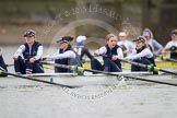 The OUWBC boat - Emily Reynolds, Shelley Pearson, Anastasia Chitty, and Maxie Scheske at bow, with the Molesey BC boat in the background.