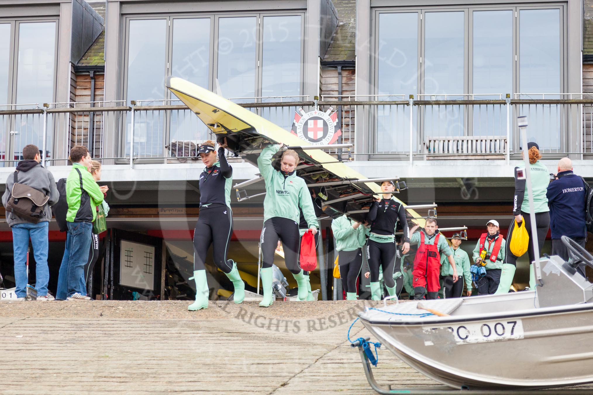 The Boat Race season 2016 - Women's Boat Race Trial Eights (CUWBC, Cambridge): CUWBC boat "Twickenham" is carried from Thames Rowing Club down to the river.
River Thames between Putney Bridge and Mortlake,
London SW15,

United Kingdom,
on 10 December 2015 at 10:15, image #4