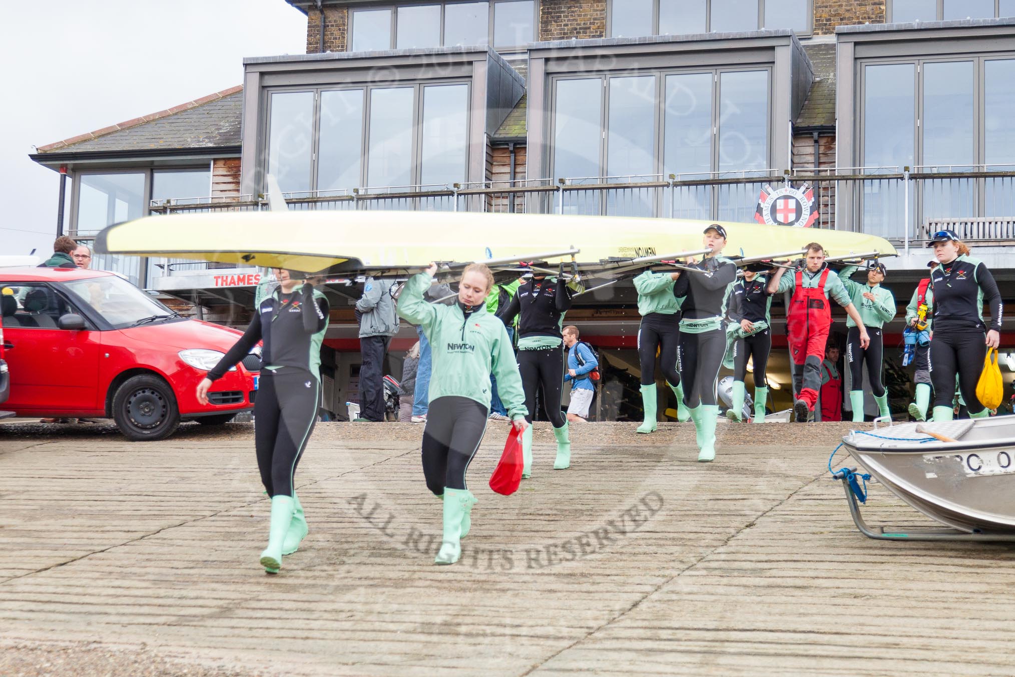 The Boat Race season 2016 - Women's Boat Race Trial Eights (CUWBC, Cambridge): CUWBC boat "Twickenham" is carried from Thames Rowing Club down to the river.
River Thames between Putney Bridge and Mortlake,
London SW15,

United Kingdom,
on 10 December 2015 at 10:15, image #5