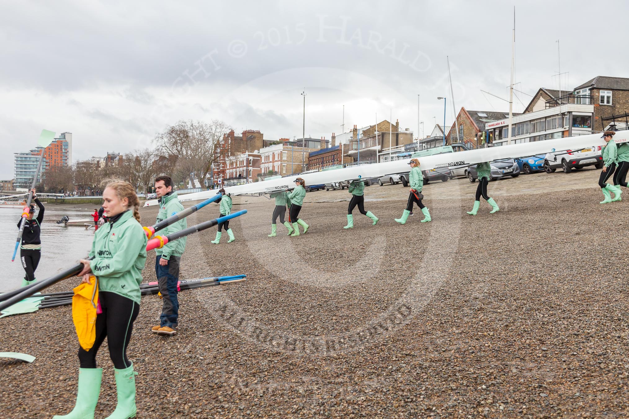 The Boat Race season 2016 - Women's Boat Race Trial Eights (CUWBC, Cambridge): CUWBC boat "Tideway" is carried from Thames Rowing Club down to the river.
River Thames between Putney Bridge and Mortlake,
London SW15,

United Kingdom,
on 10 December 2015 at 10:16, image #11