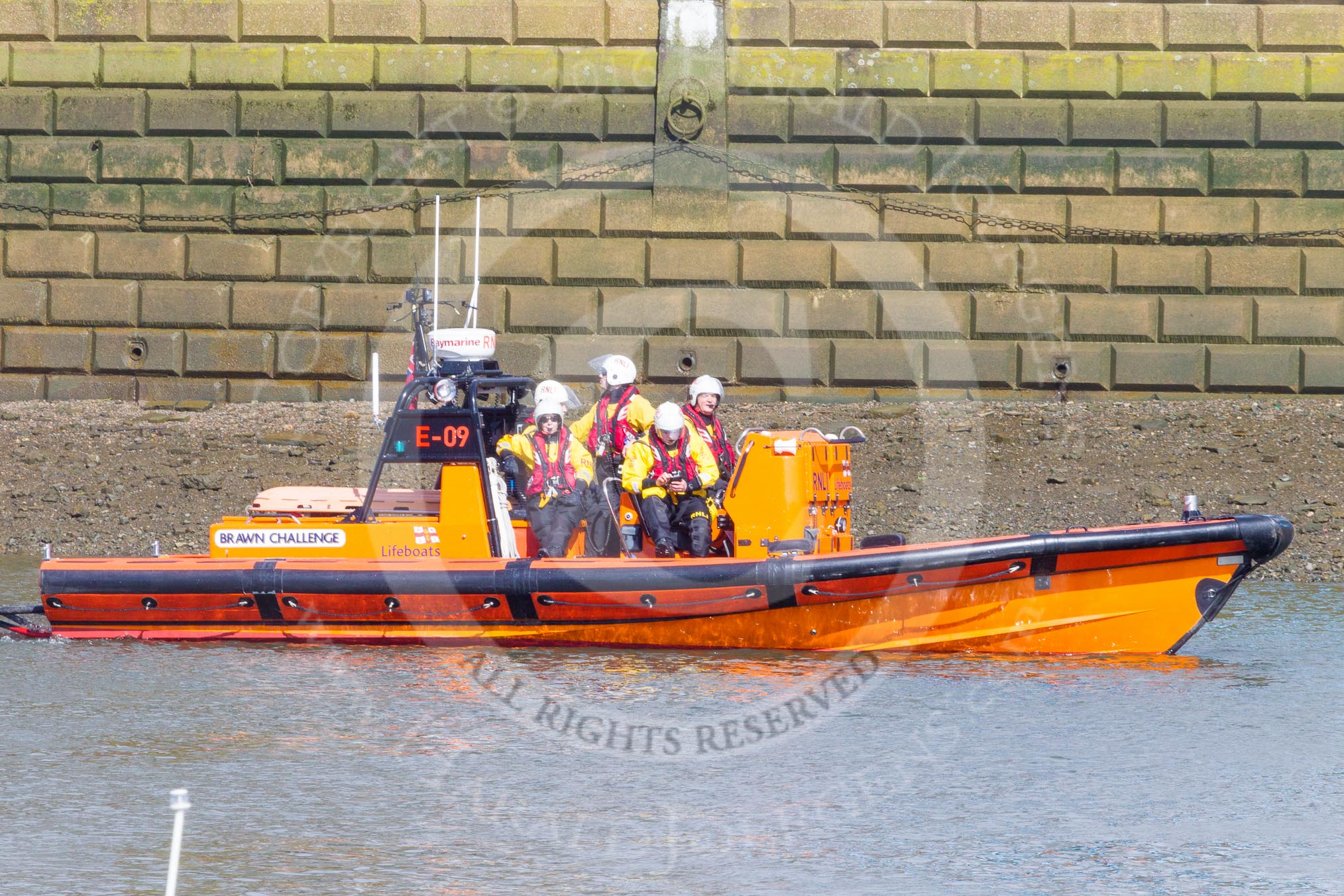 The Boat Race season 2016 -  The Cancer Research Women's Boat Race: RNLI lifeboatt E-09 in position at Putney Bridge - see http://j.mp/rnli-e-class for a highly detailed and entertaining virtual tour of the boat!.
River Thames between Putney Bridge and Mortlake,
London SW15,

United Kingdom,
on 27 March 2016 at 13:29, image #106