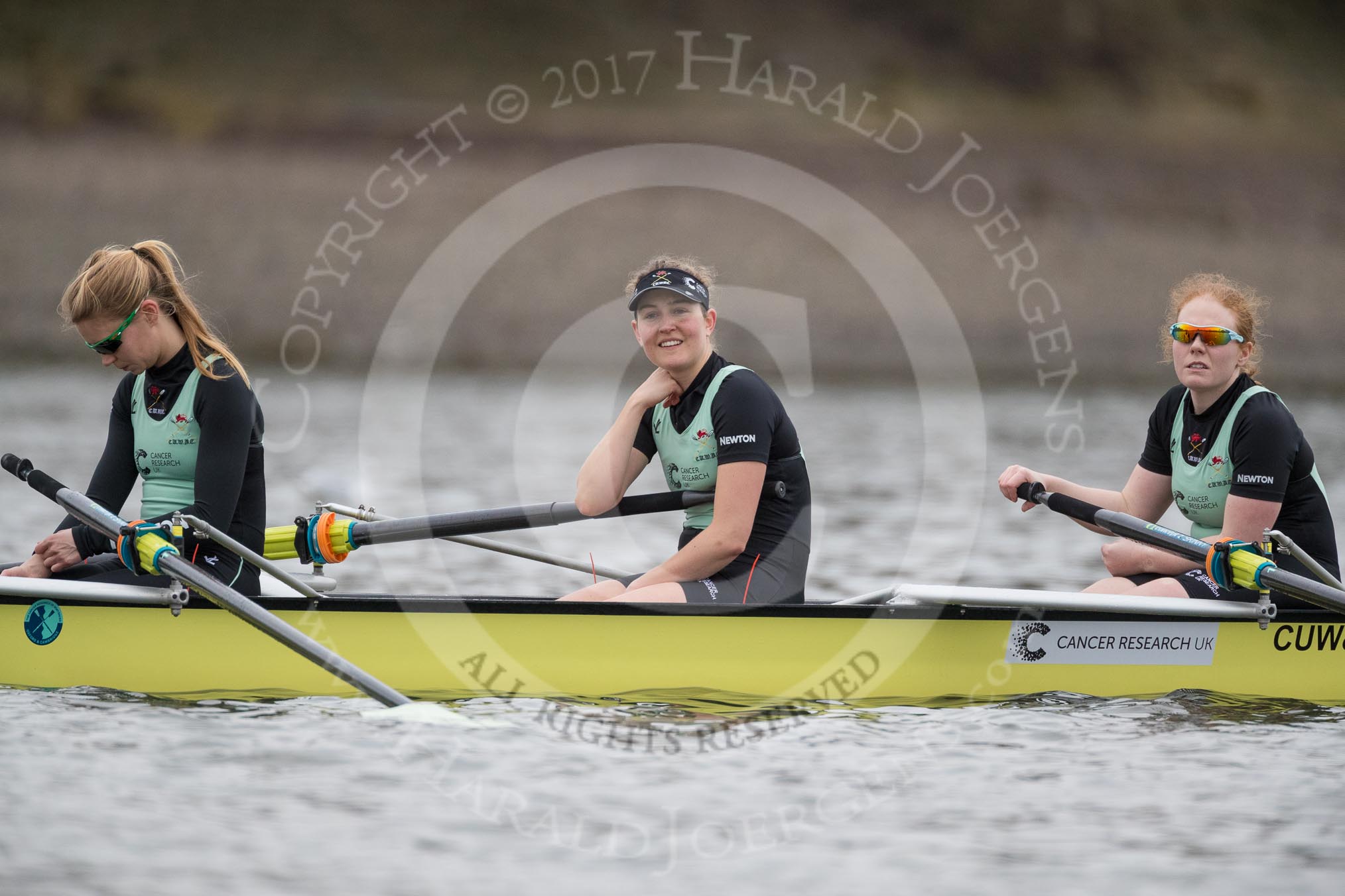 The Boat Race season 2017 - Women's Boat Race Fixture CUWBC vs Univerity of London: The CUWBC eight before the start of the race, here 3 - Ashton Brown, 2 - Kirsten Van Fosen, bow - Claire Lambe.
River Thames between Putney Bridge and Mortlake,
London SW15,

United Kingdom,
on 19 February 2017 at 15:52, image #34