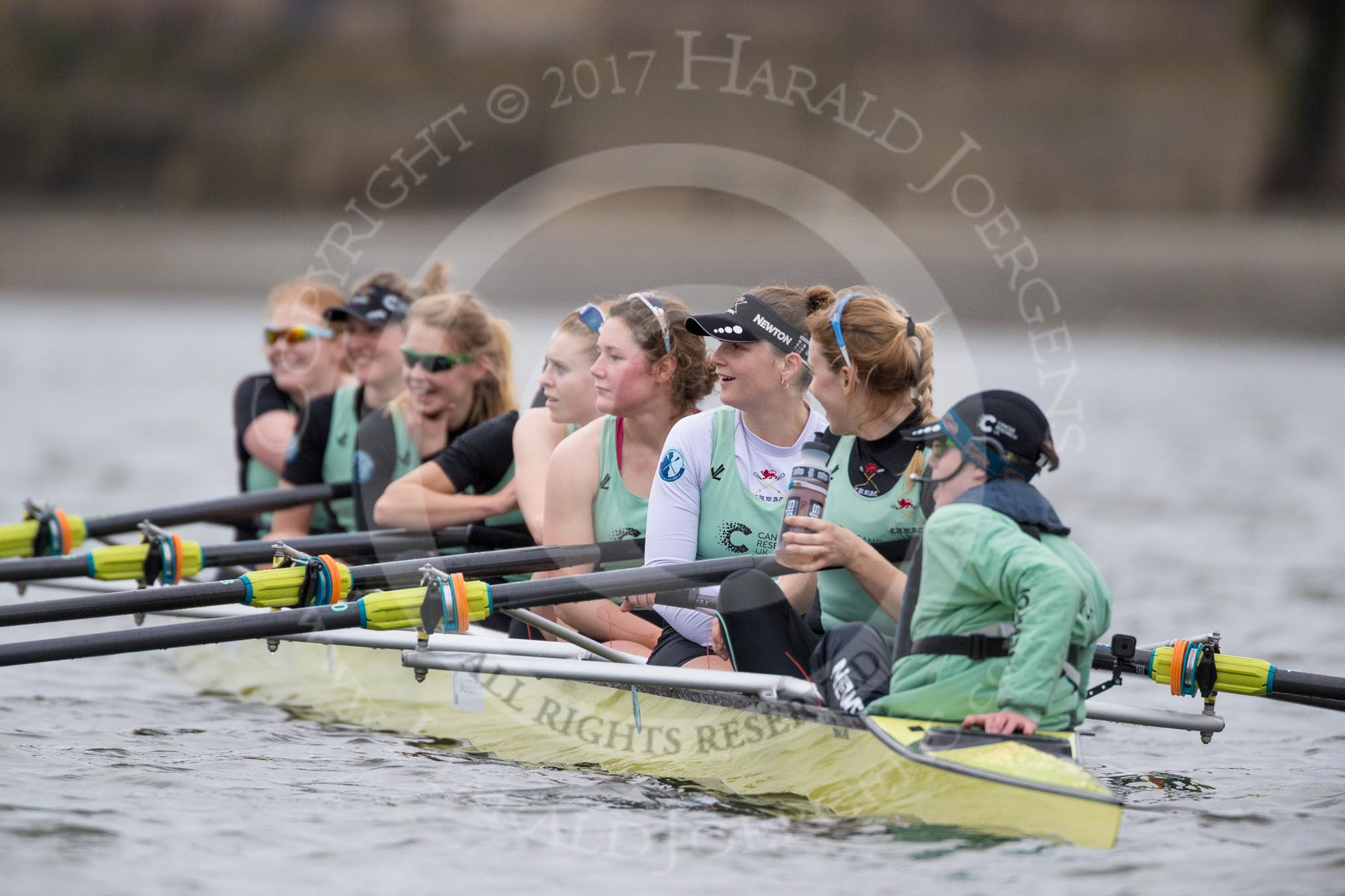 The Boat Race season 2017 - Women's Boat Race Fixture CUWBC vs Univerity of London: The first part of the fixture ended at Hammersmith Brdige, CUWBC (bow - Claire Lambe, 2 - Kirsten Van Fosen, 3 - Ashton Brown, 4 - Imogen Grant, 5 - Holy Hill, 6 - Melissa Wilson, 7 - Myriam Goudet, stroke - Alice White, cox - Matthew Holland) during a debrief from their coaches.
River Thames between Putney Bridge and Mortlake,
London SW15,

United Kingdom,
on 19 February 2017 at 16:14, image #102