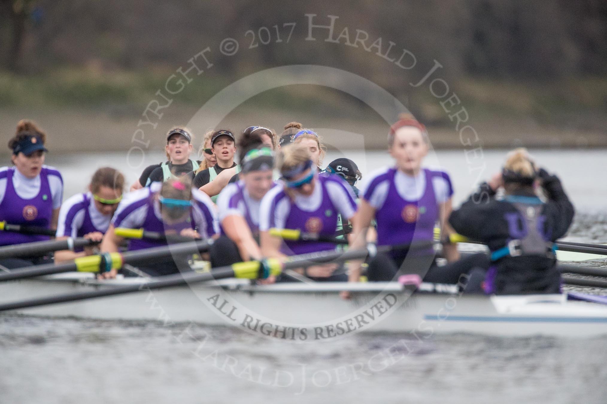 The Boat Race season 2017 - Women's Boat Race Fixture CUWBC vs Univerity of London: The UL eight seen in front of the CUWBC boat after crossing the finish line, with the focus on Cambridge: bow - Claire Lambe, 2 - Kirsten Van Fosen, 3 - Ashton Brown, 4 - Imogen Grant, 5 - Holy Hill, 6 - Melissa Wilson, 7 - Myriam Goudet, stroke - Alice White, cox - Matthew Holland.
River Thames between Putney Bridge and Mortlake,
London SW15,

United Kingdom,
on 19 February 2017 at 16:29, image #150