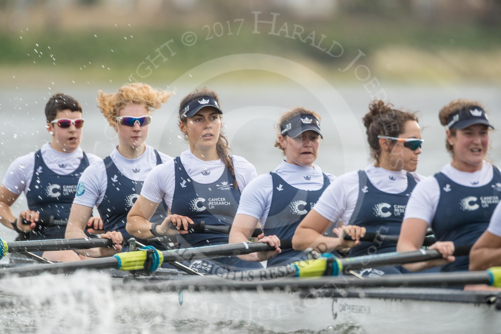 The Cancer Research UK Boat Race season 2017 - Women's Boat Race Fixture OUWBC vs Molesey BC: OUWBC in choppy waters - bow Alice Roberts, 2 Beth Bridgman, 3 Rebecca Te Water Naude, 4 Rebecca Esselstein, 5 Chloe Laverack, 6 Harriet Austin.
River Thames between Putney Bridge and Mortlake,
London SW15,

United Kingdom,
on 19 March 2017 at 16:21, image #131