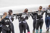 The Cancer Research UK Boat Race season 2017 - Women's Boat Race Fixture OUWBC vs Molesey BC: The Molesey ladies carrying their boat from the boathouse to the river, in front cox Anna Corderoy.
River Thames between Putney Bridge and Mortlake,
London SW15,

United Kingdom,
on 19 March 2017 at 15:24, image #22
