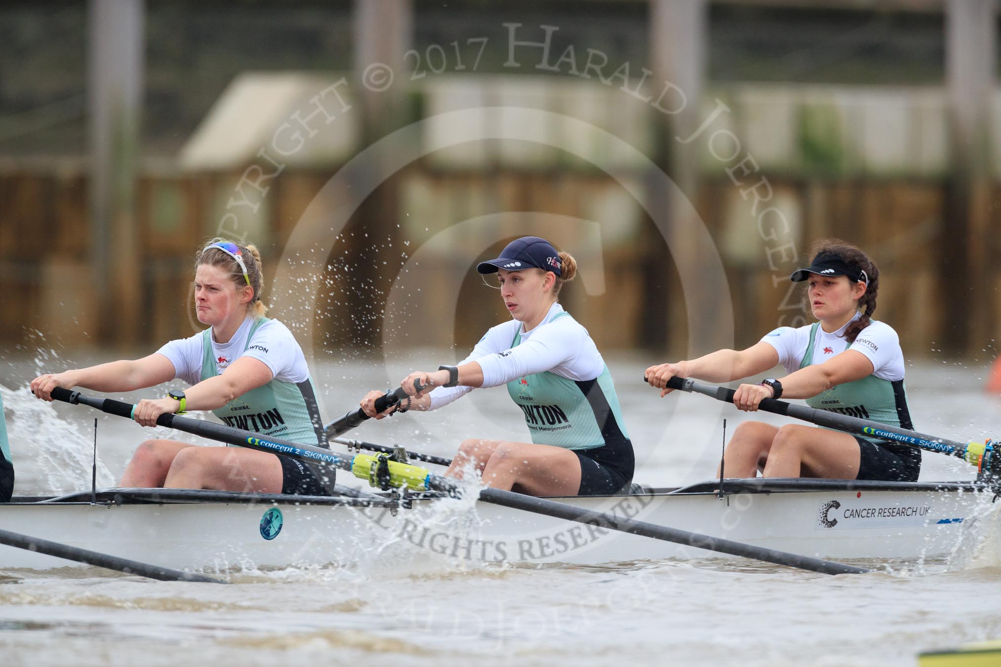 The Boat Race season 2018 - Women's Boat Race Trial Eights (CUWBC, Cambridge): Expecto Patronum after the start of the race, here 3 Sally O Brien, 2 Millie Perrin, bow Eve Caroe.
River Thames between Putney Bridge and Mortlake,
London SW15,

United Kingdom,
on 05 December 2017 at 12:43, image #56