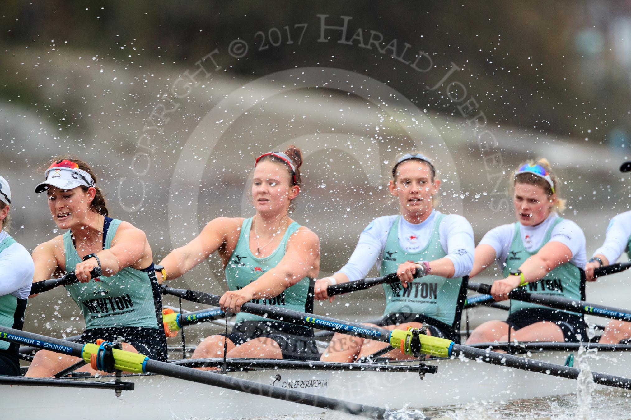 The Boat Race season 2018 - Women's Boat Race Trial Eights (CUWBC, Cambridge): Expecto Patronum with a lot of spray flying around: 6 Thea Zabell, 5 Kelsey Barolak, 4 Laura Foster, 3 Sally O Brien.
River Thames between Putney Bridge and Mortlake,
London SW15,

United Kingdom,
on 05 December 2017 at 12:51, image #115