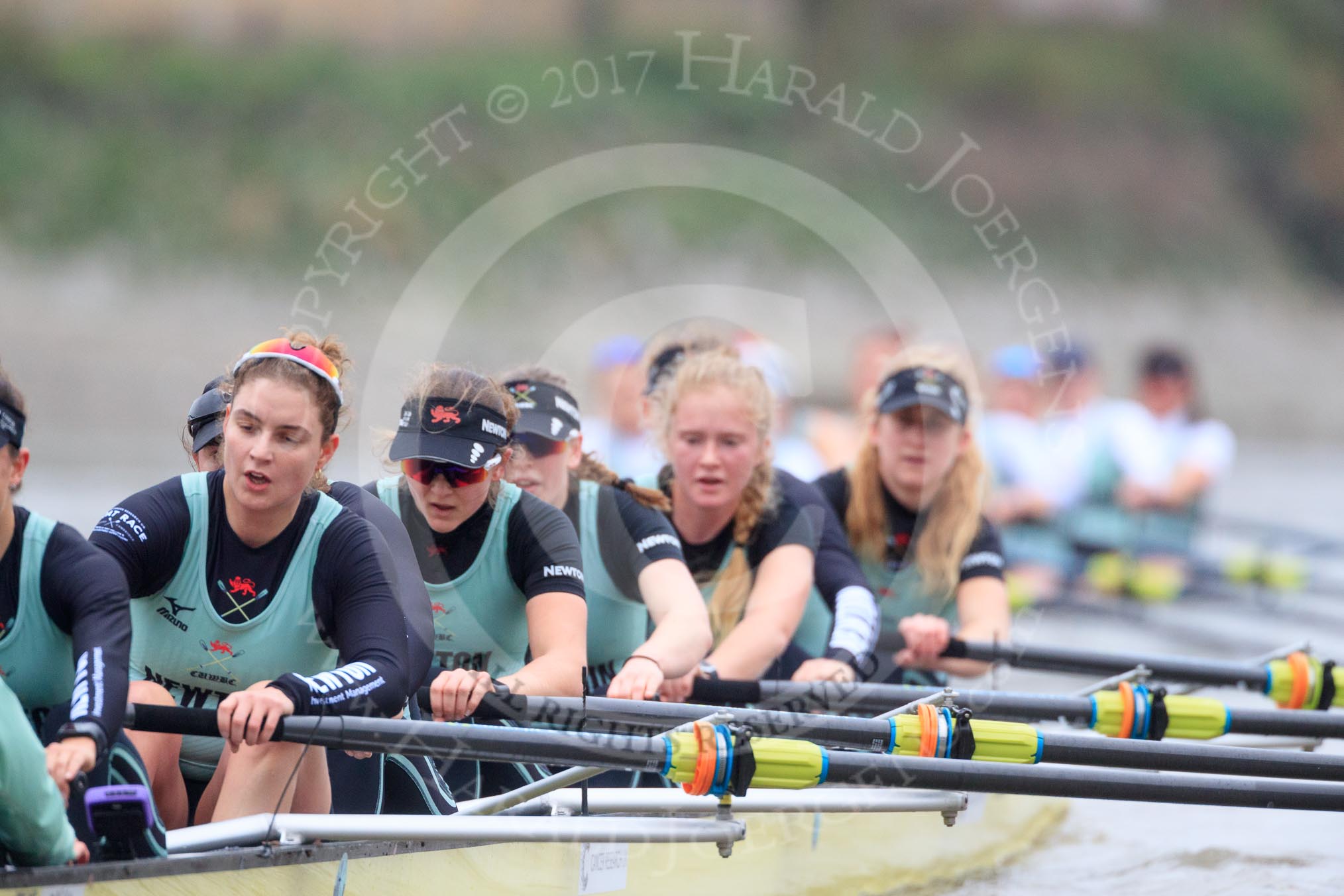 The Boat Race season 2018 - Women's Boat Race Trial Eights (CUWBC, Cambridge): Wingardium Leviosa approaching the finish line, here stroke Imogen Grant, 7 Myriam Goudet-Boukhatmi, 6 Larkin Sayre, 5 Tricia Smith, 4 Emma Andrews, 3 Pippa Darkin, 2 Sarah Carlotti, bow Lucy Pike.
River Thames between Putney Bridge and Mortlake,
London SW15,

United Kingdom,
on 05 December 2017 at 12:59, image #160