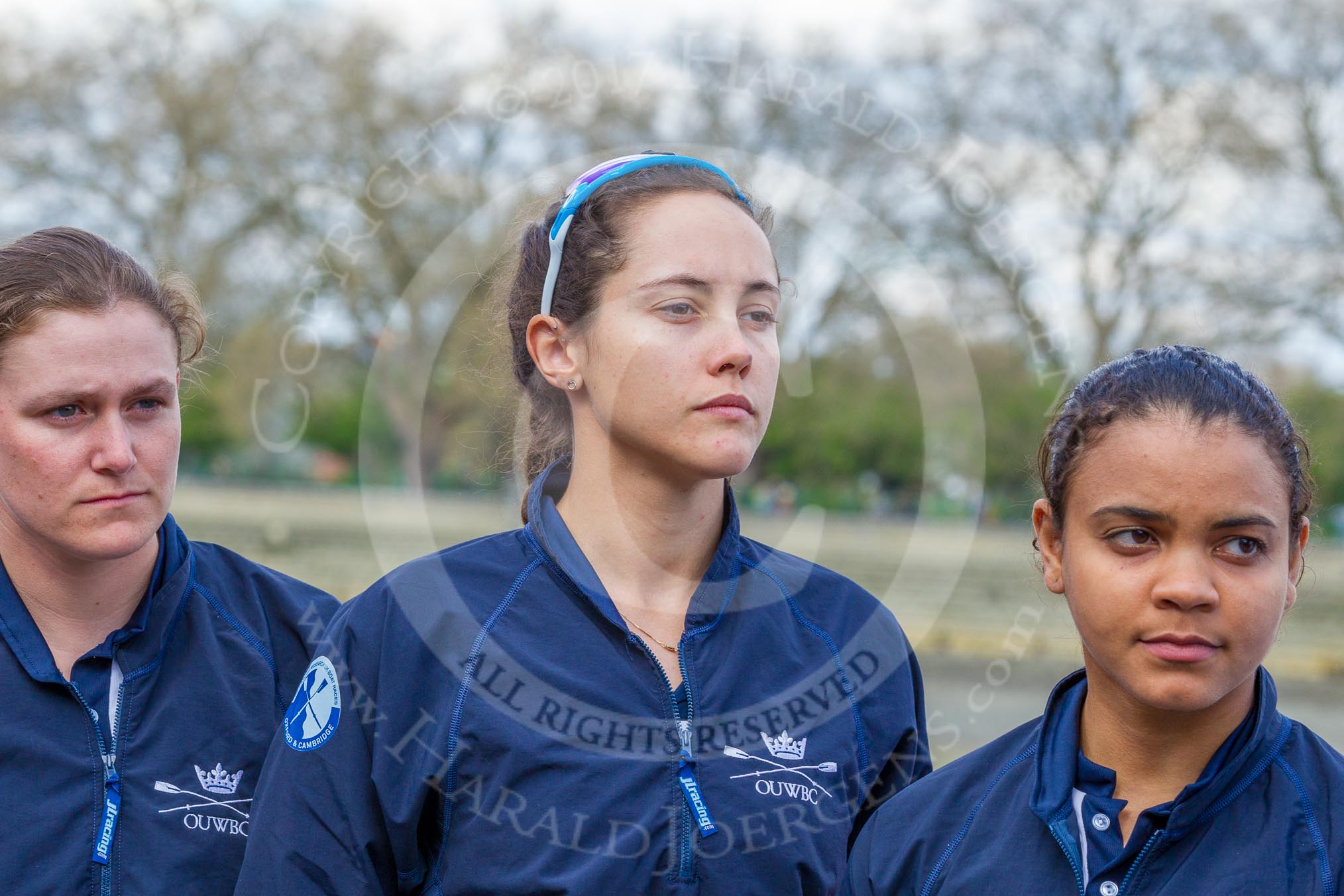 The Boat Race season 2017 -  The Cancer Research Women's Boat Race: OUWBC's 4 seat 4 Rebecca Esselstein, 5 seat Chloe Laverack, and 7 seat Jenna Hebert at the toss.
River Thames between Putney Bridge and Mortlake,
London SW15,

United Kingdom,
on 02 April 2017 at 14:40, image #24