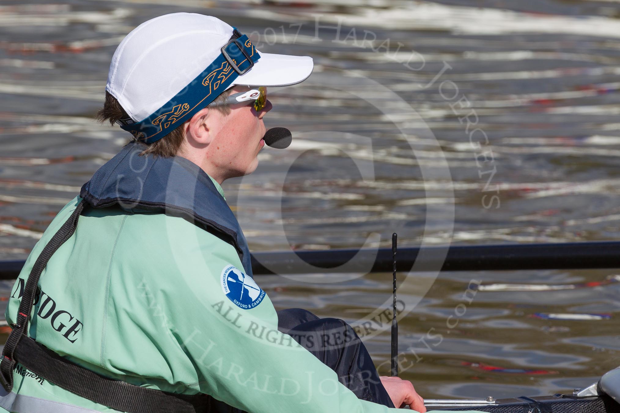 The Boat Race season 2017 -  The Cancer Research Women's Boat Race: CUWBC on the way to Putney Bridge before the start of the Women's Boat Race, here cox Matthew Holland.
River Thames between Putney Bridge and Mortlake,
London SW15,

United Kingdom,
on 02 April 2017 at 15:50, image #75