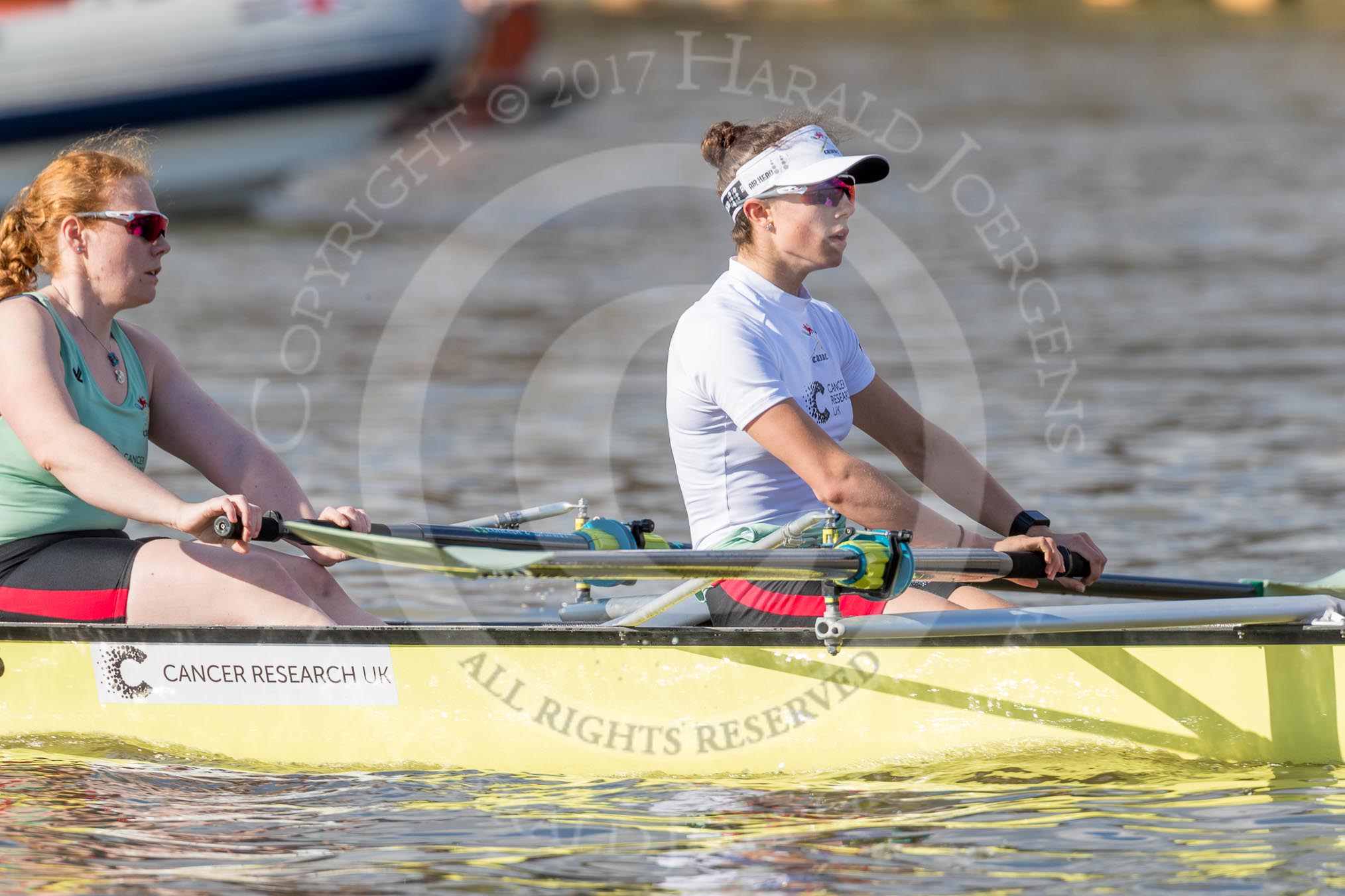 The Boat Race season 2017 -  The Cancer Research Women's Boat Race: CUWBC about to reach the start of the Women's Boat Race, here bow Ashton Brown, 2 Imogen Grant.
River Thames between Putney Bridge and Mortlake,
London SW15,

United Kingdom,
on 02 April 2017 at 16:25, image #105