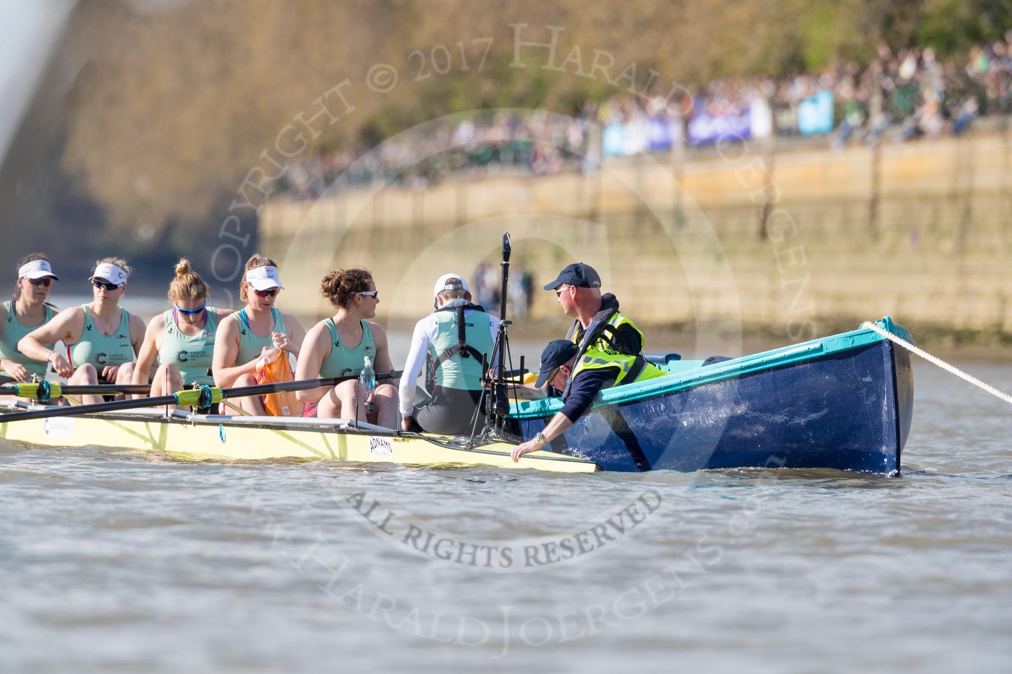 The Boat Race season 2017 -  The Cancer Research Women's Boat Race: The CUWBC eight at the stake boat, here 4 Anna Dawson, 5 Holly Hill, 6 Alice White, 7 Myriam Goudet, stroke Melissa Wilson, cox Matthew Holland.
River Thames between Putney Bridge and Mortlake,
London SW15,

United Kingdom,
on 02 April 2017 at 16:29, image #112
