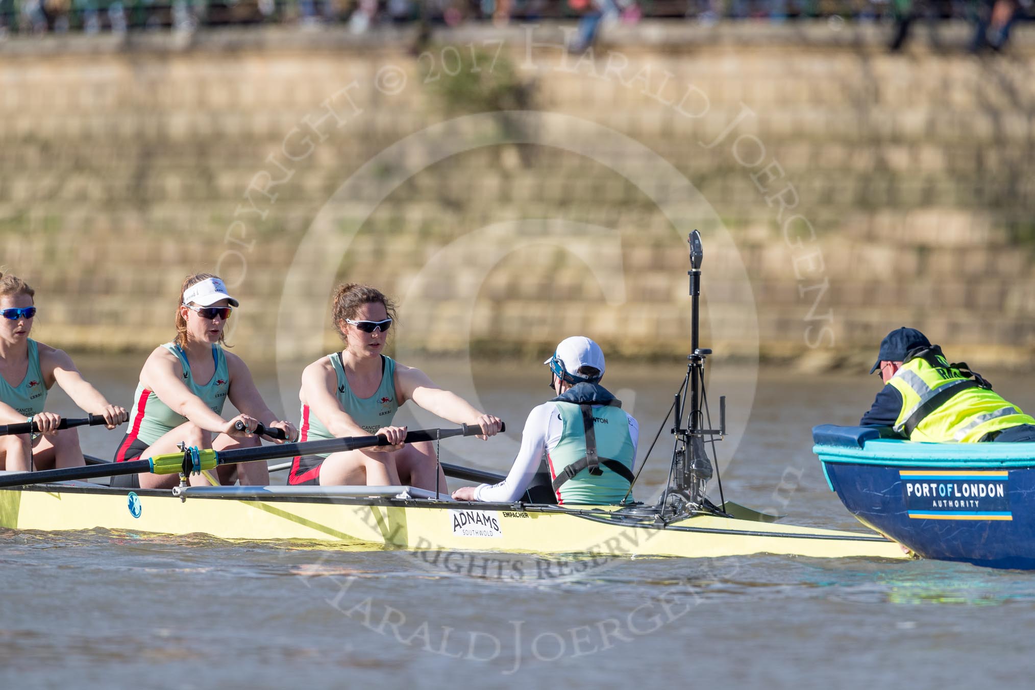 The Boat Race season 2017 -  The Cancer Research Women's Boat Race: The Cambridge Eight ready for the start at the stake boat, here 6 Alice White, 7 Myriam Goudet, stroke Melissa Wilson, cox Matthew Holland.
River Thames between Putney Bridge and Mortlake,
London SW15,

United Kingdom,
on 02 April 2017 at 16:35, image #119
