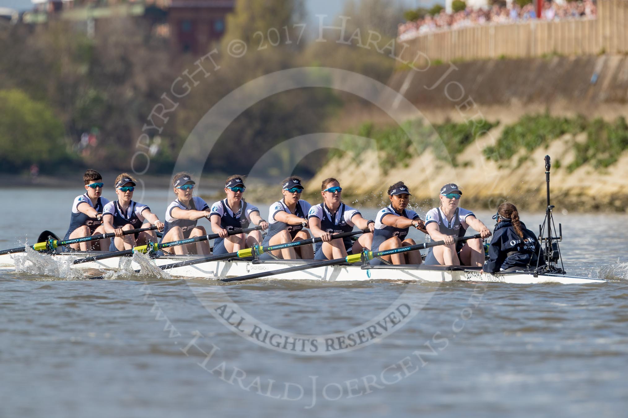 The Boat Race season 2017 -  The Cancer Research Women's Boat Race: OUWBC working hard to catch up with Cambridge, here bow Alice Roberts, 2 Flo Pickles, 3 Rebecca Te Water Naudé, 4 Rebecca Esselstein, 5 Chloe Laverack, 6 Harriet Austin, 7 Jenna Hebert, stroke Emily Cameron, cox Eleanor Shearer.
River Thames between Putney Bridge and Mortlake,
London SW15,

United Kingdom,
on 02 April 2017 at 16:37, image #137